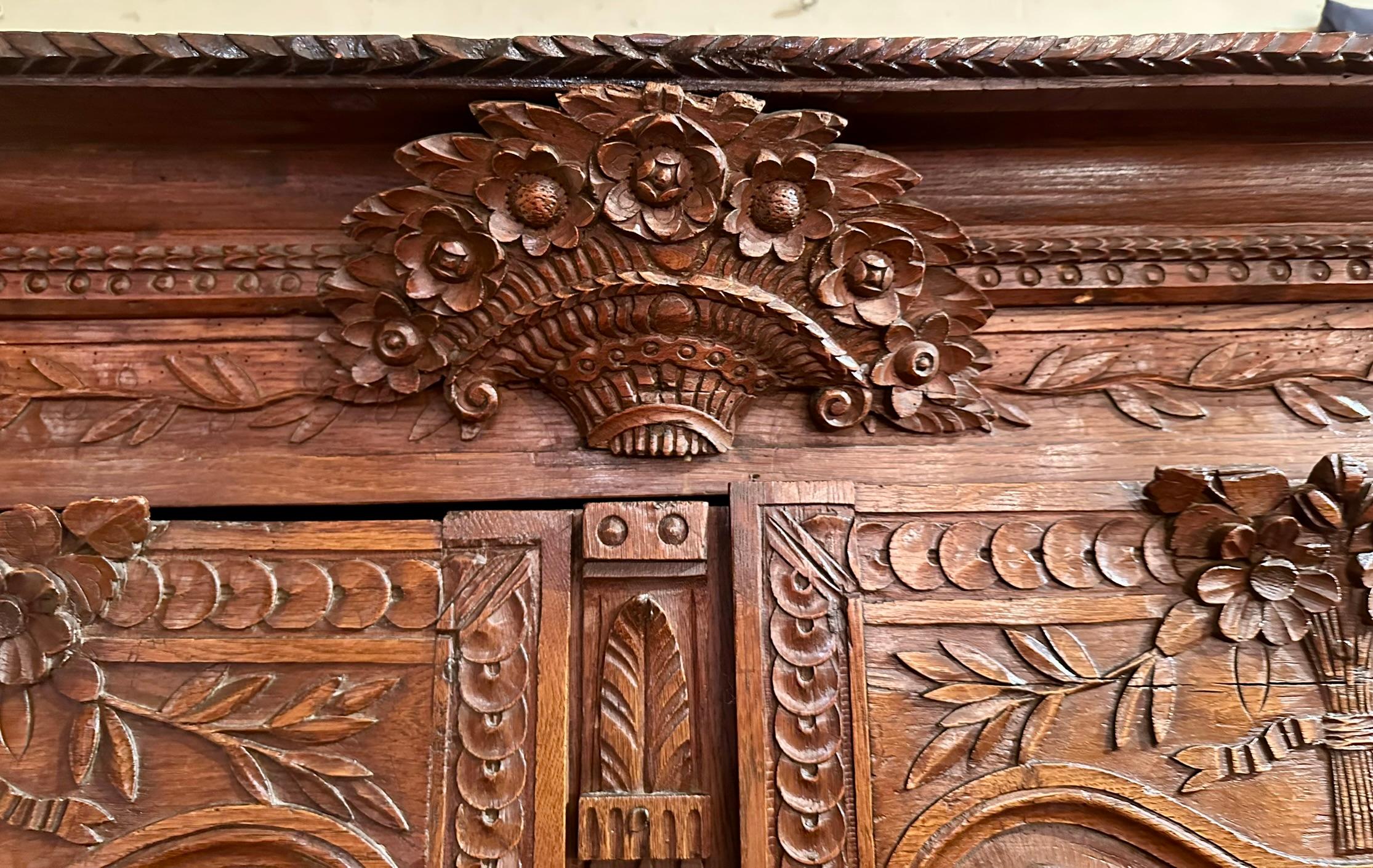 19th Century Antique French Lyonnaise Carved Oak Armoire, Circa 1790-1810. For Sale