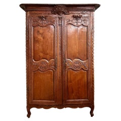 Antique French Lyonnaise Carved Oak Armoire, Circa 1790-1810.