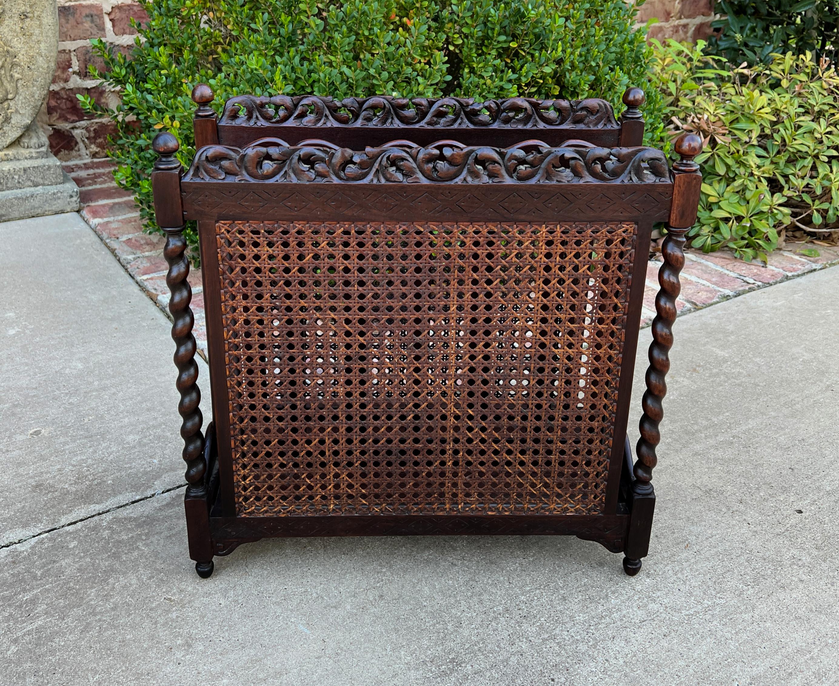 Antique French oak caned barley twist magazine rack or book stand~~circa 1920s
Charming decorative accent piece for today's home~~perfect for a reading nook, living area, bedroom, or study/office
Caned sides with Classic barley twist posts
Versatile