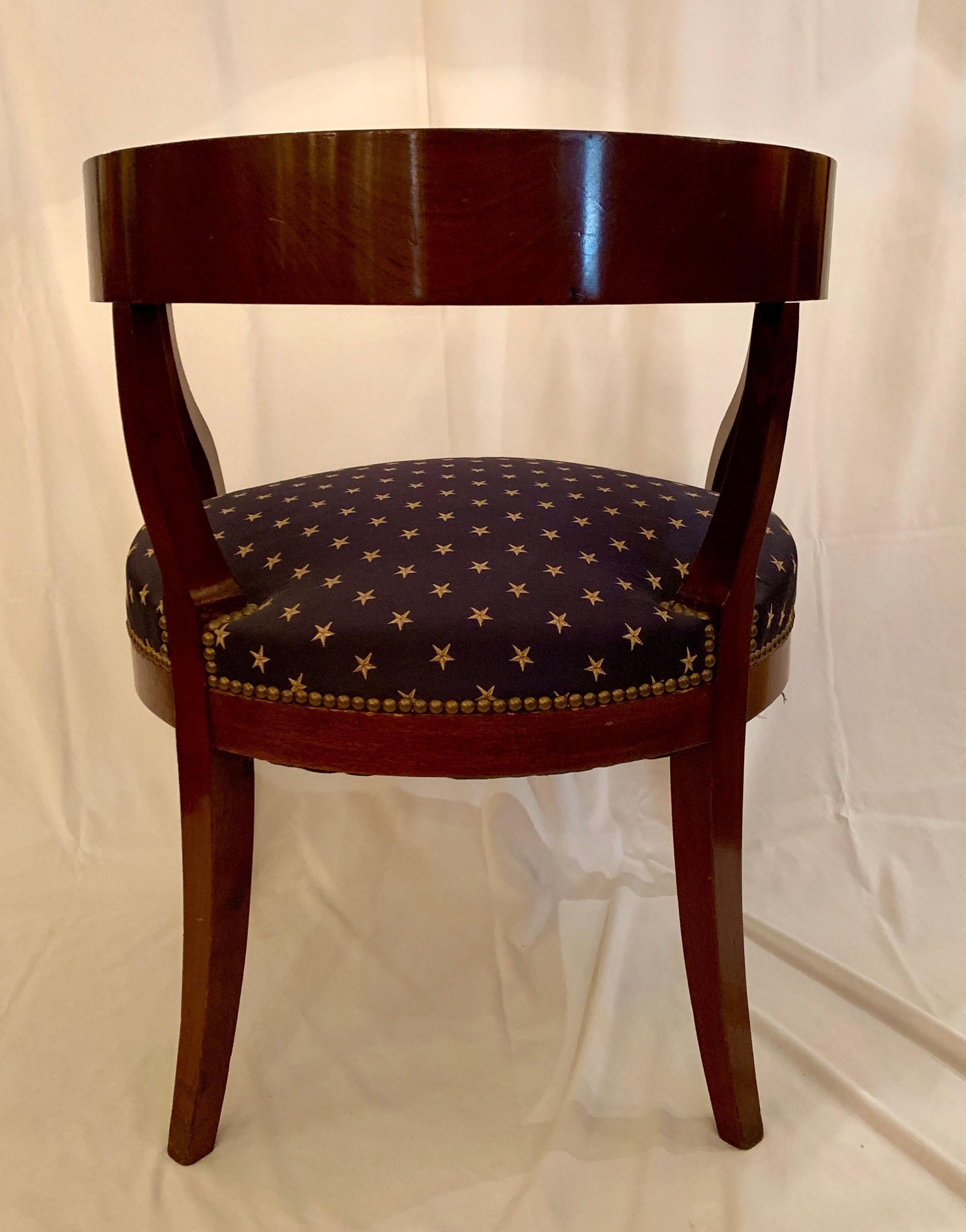 A pleasing chair with its navy and blue stars upholstery.