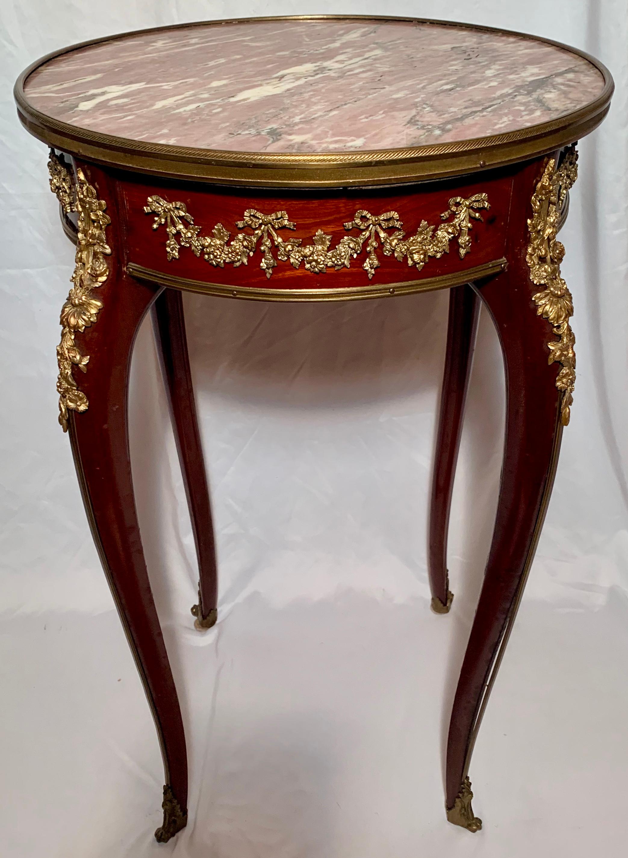 Antique French mahogany Breche d'Alep marble-top table with ormolu mounts.
 