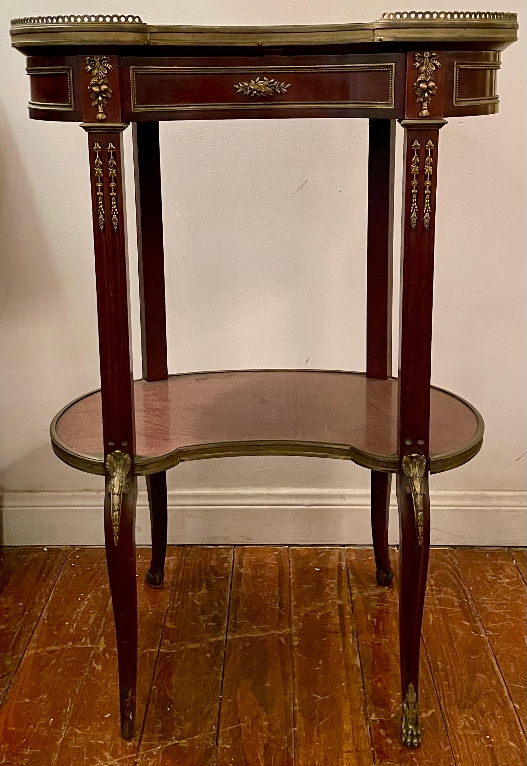 Antique French Mahogany and Gold Bronze Marble Top Kidney Shaped Table with Gallery, CIRCA 1890.