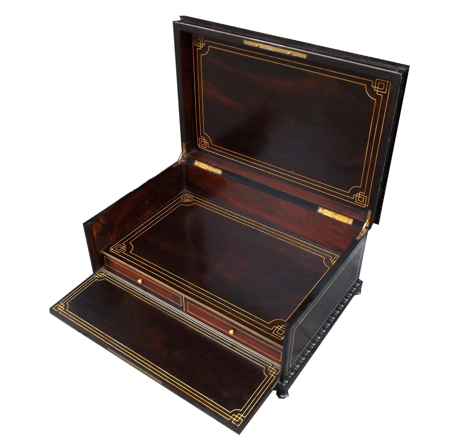 A very elegant large French dark mahogany inlaid with ebony, mother of pearl, Abalone and brass stringing casket of very generous proportions and of outstanding Museum quality, firmly attributed to Alphonse Tahan Paris (1830-1880), official master