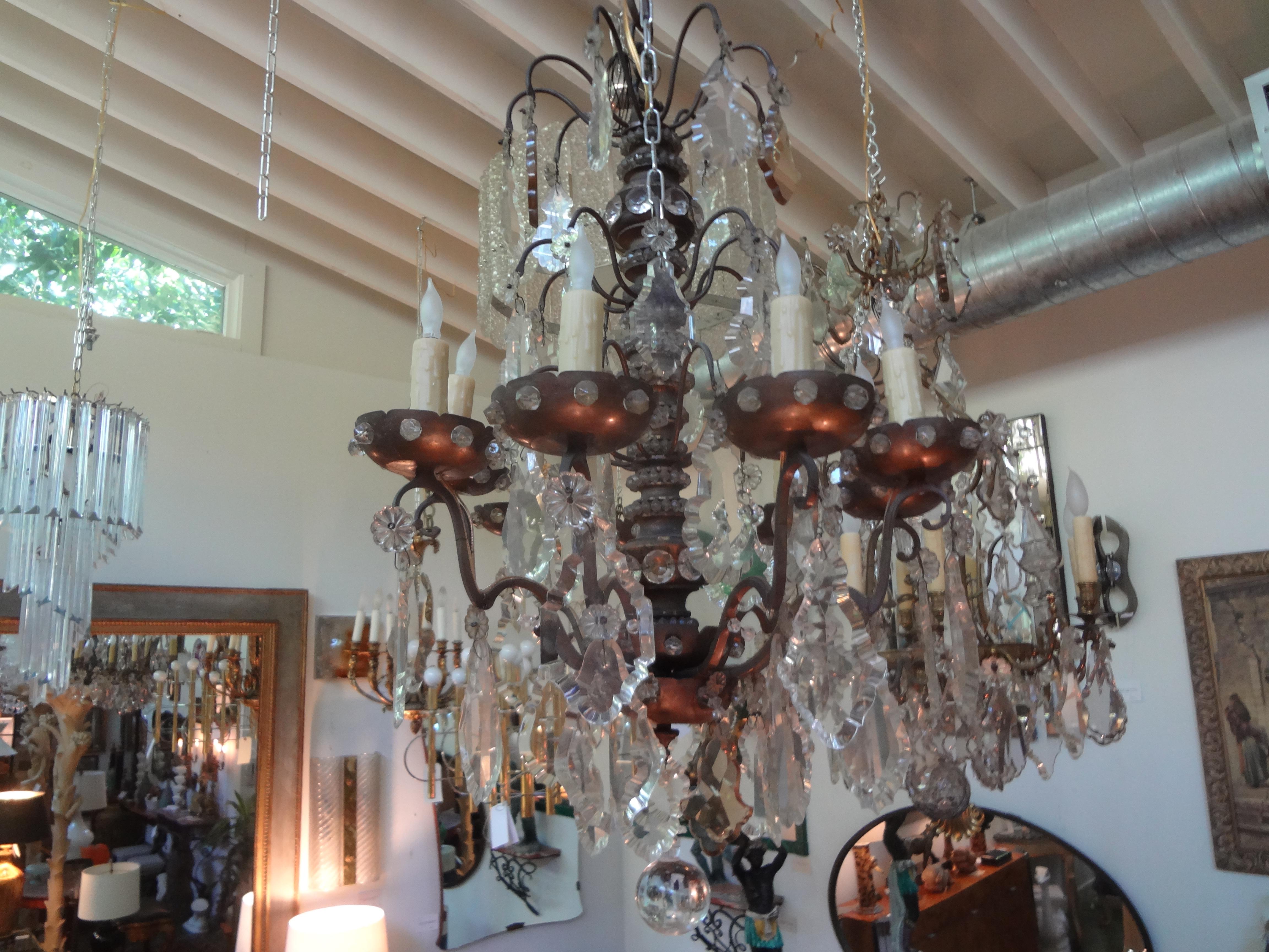 Antique French Maison Bagues attributed beaded and crystal chandelier.
Unusual French Maison Baguès attributed Louis XVI style bronze and wood beaded and crystal chandelier. This stunning French nine-light beaded and crystal chandelier has been