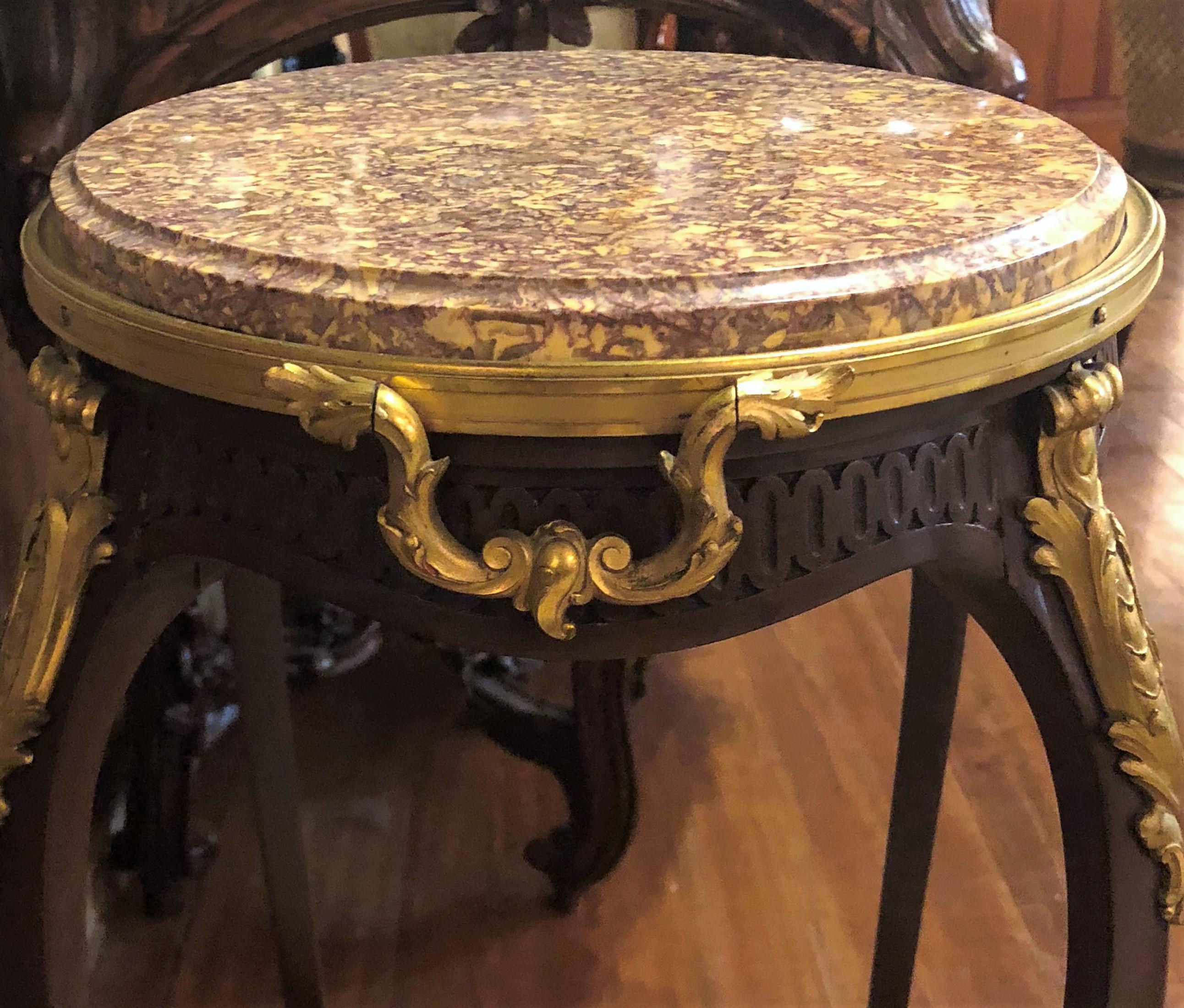 This table has a lovely oval shape and is very appealing in form and construction. It is a typically beautiful little French table.