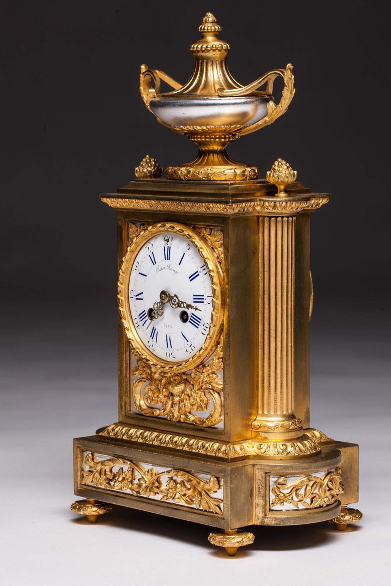 Beautiful clock by Victor Freres one of the four famous Raingo brothers. The clock is decorated with inlaid bronze ornaments and is silver plated. The urn at the top of the clock is also silvered. Clock in perfect condition.
The clockmaker and