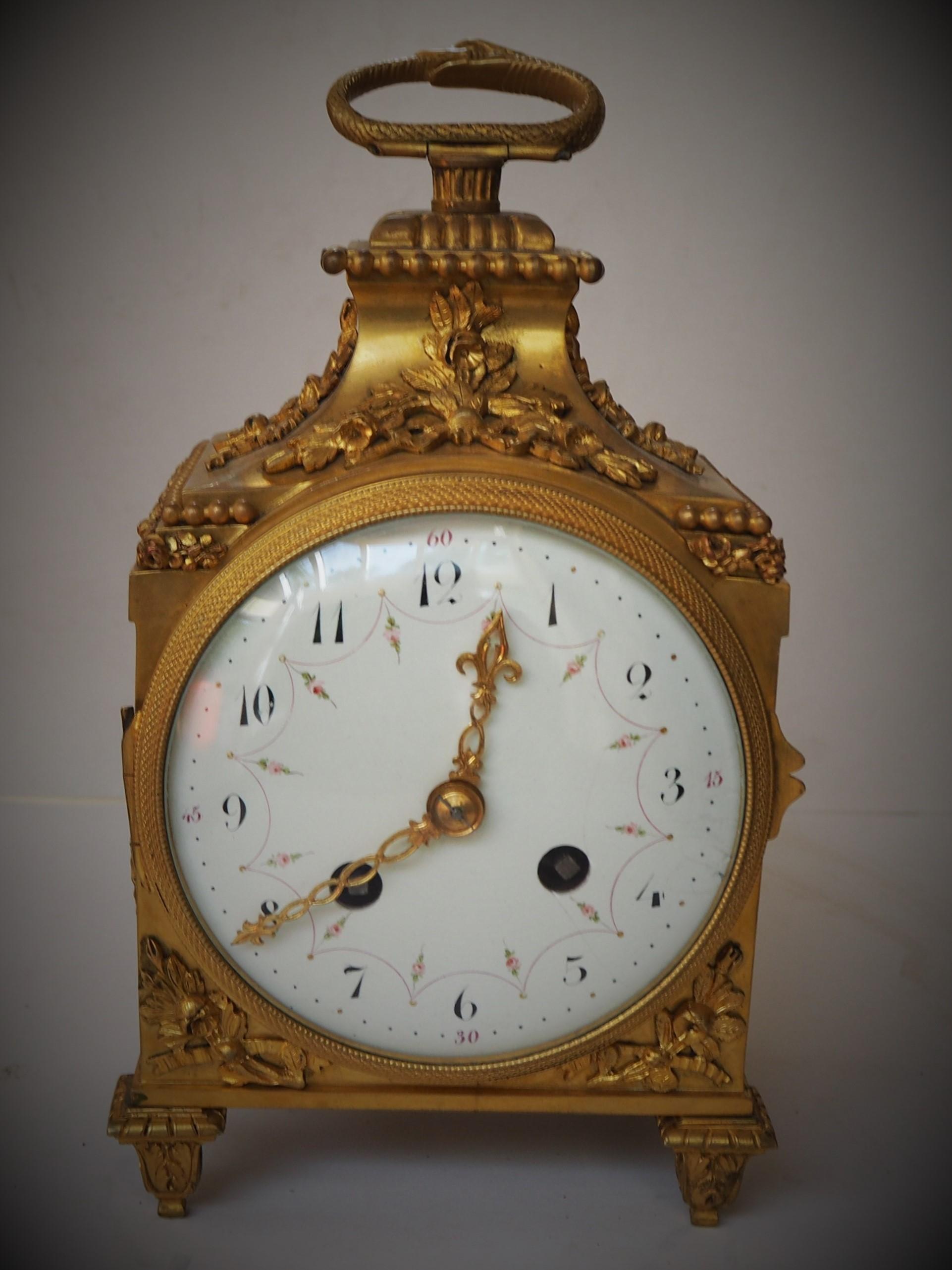 19th Century French gilt bronze mantle clock by Samuel Marti Paris. Awarded the Gold Medal and exhibited in the Paris Exhibition. This rather beautiful small mantle clock has a domed enamel and sensitively decorated dial with Roman numerals, strikes