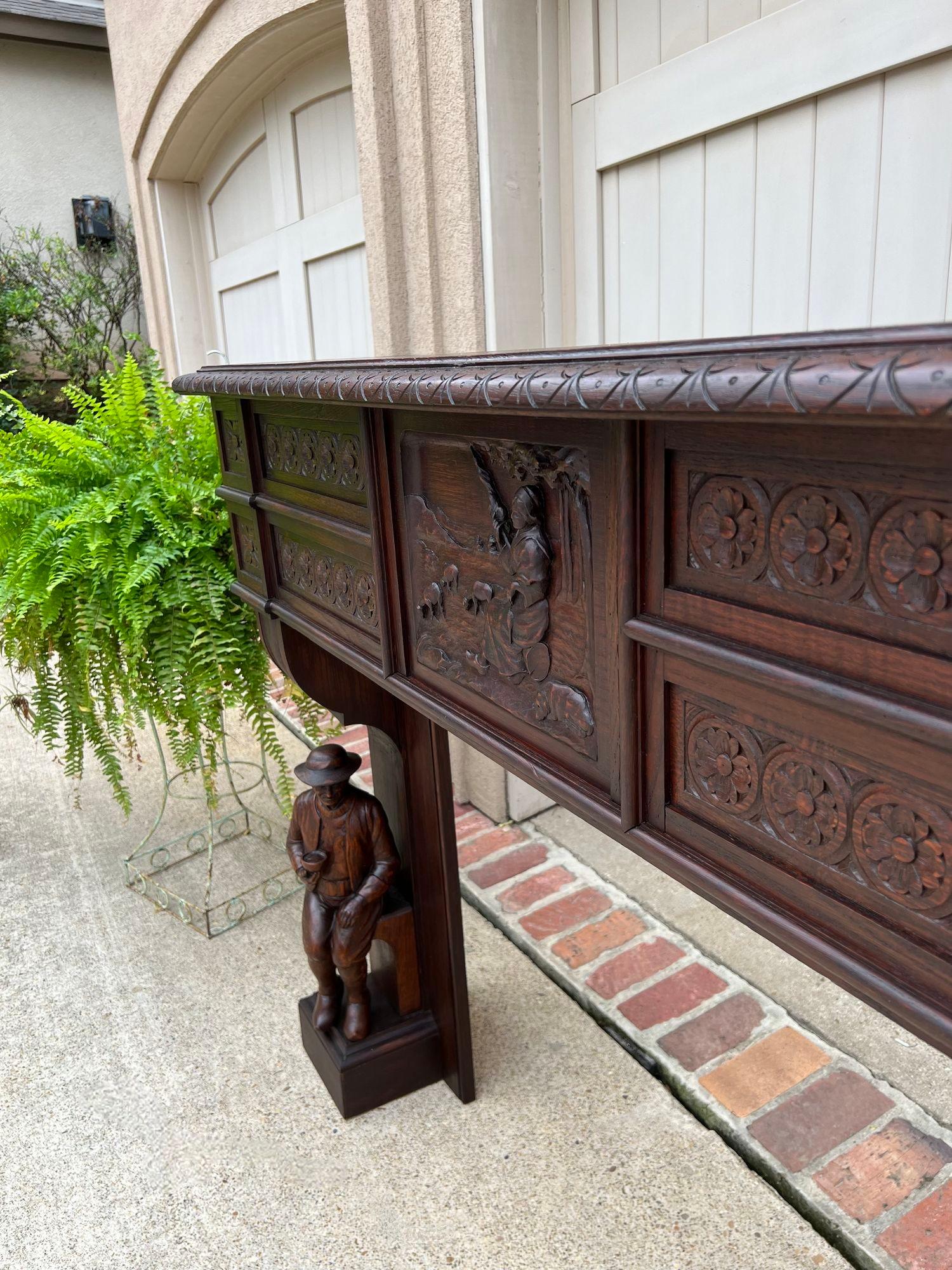 Hand-Carved Antique French Mantel Fireplace Surround Breton Brittany Carved Dark Oak For Sale