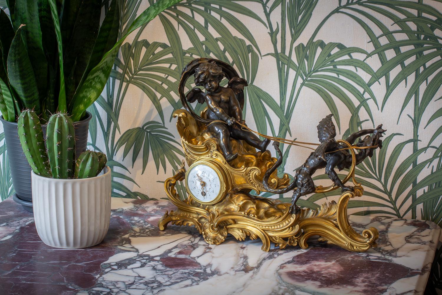 Dragon Drawn Chariot

From our Clock collection, we are thrilled to introduce this French Mantle Clock attributed to Francois Linke. The Clock in the rococo style cast as a winged Cherub wearing a billowing robe riding in a gilt chariot being pulled