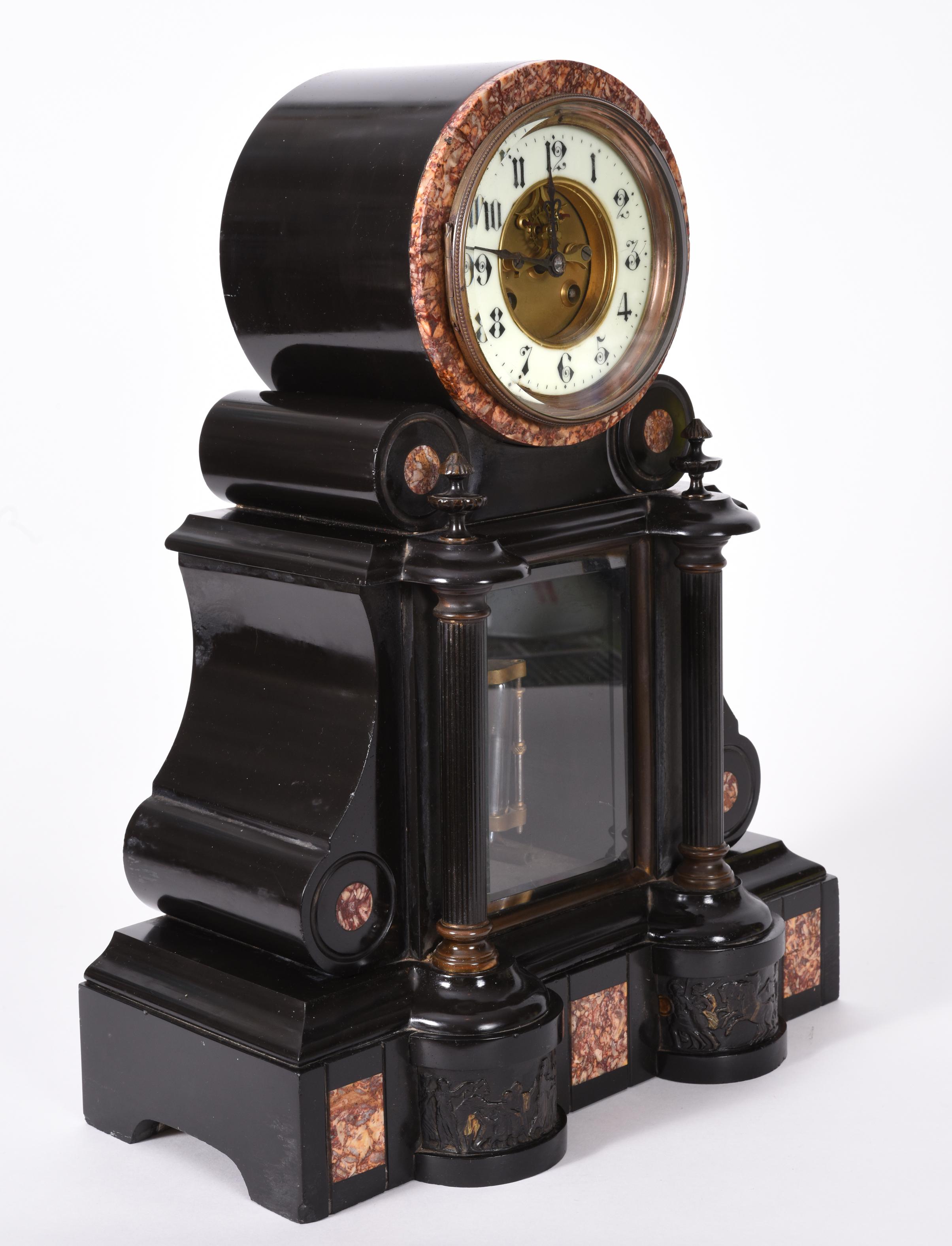 Beautiful antique French marble and bronze mantle clock . This clock is great working antique condition. The mantle clock stand about 17 inches high X 13 inches length X 5.5 inches width.