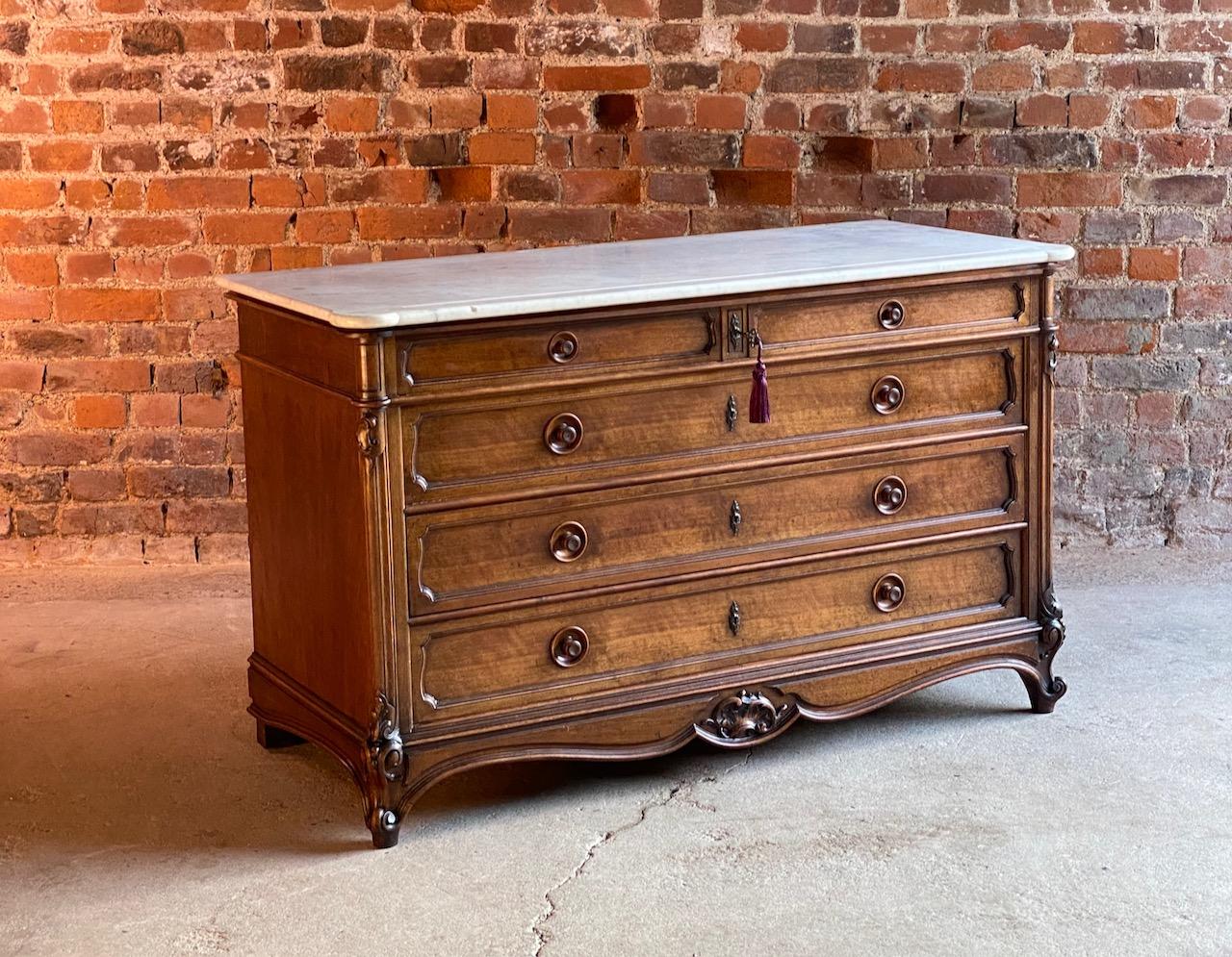 Antique French marble chest of drawers commode France circa 1890 number 14

Beautiful large French antique marble topped oak commode chest of drawers, circa 1890, this chest dates to the late 19th century, the elegant white marble top over two