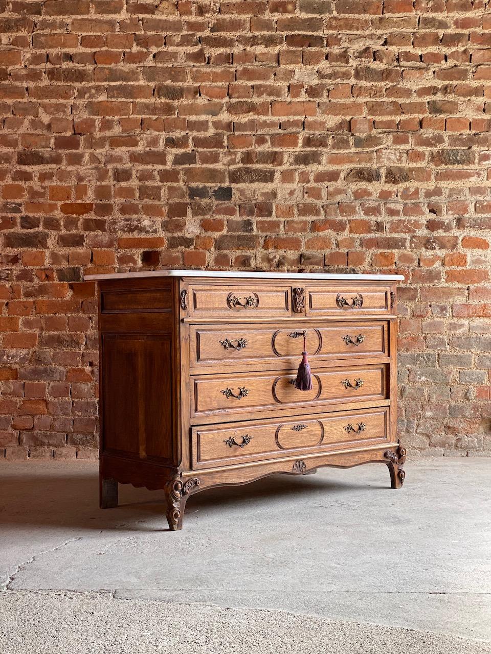 Antique French marble chest of drawers, France, circa 1890 number 1

Beautiful antique marble topped oak commode chest of drawers, circa 1890, this chest dates to the late 19th century, the elegant white and grey marble top over two short and