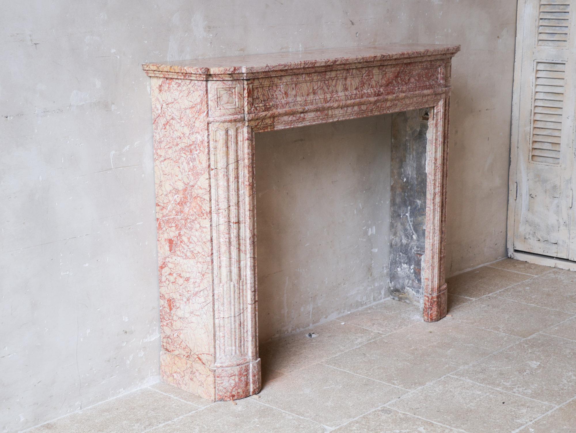Antique French marble fireplace in pink tones For Sale 5