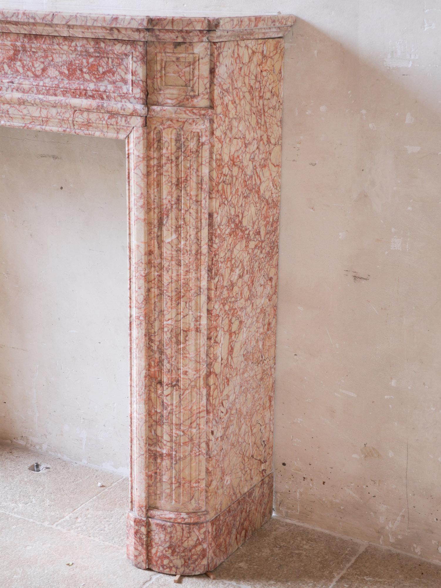 Antique French marble fireplace in pink tones For Sale 1