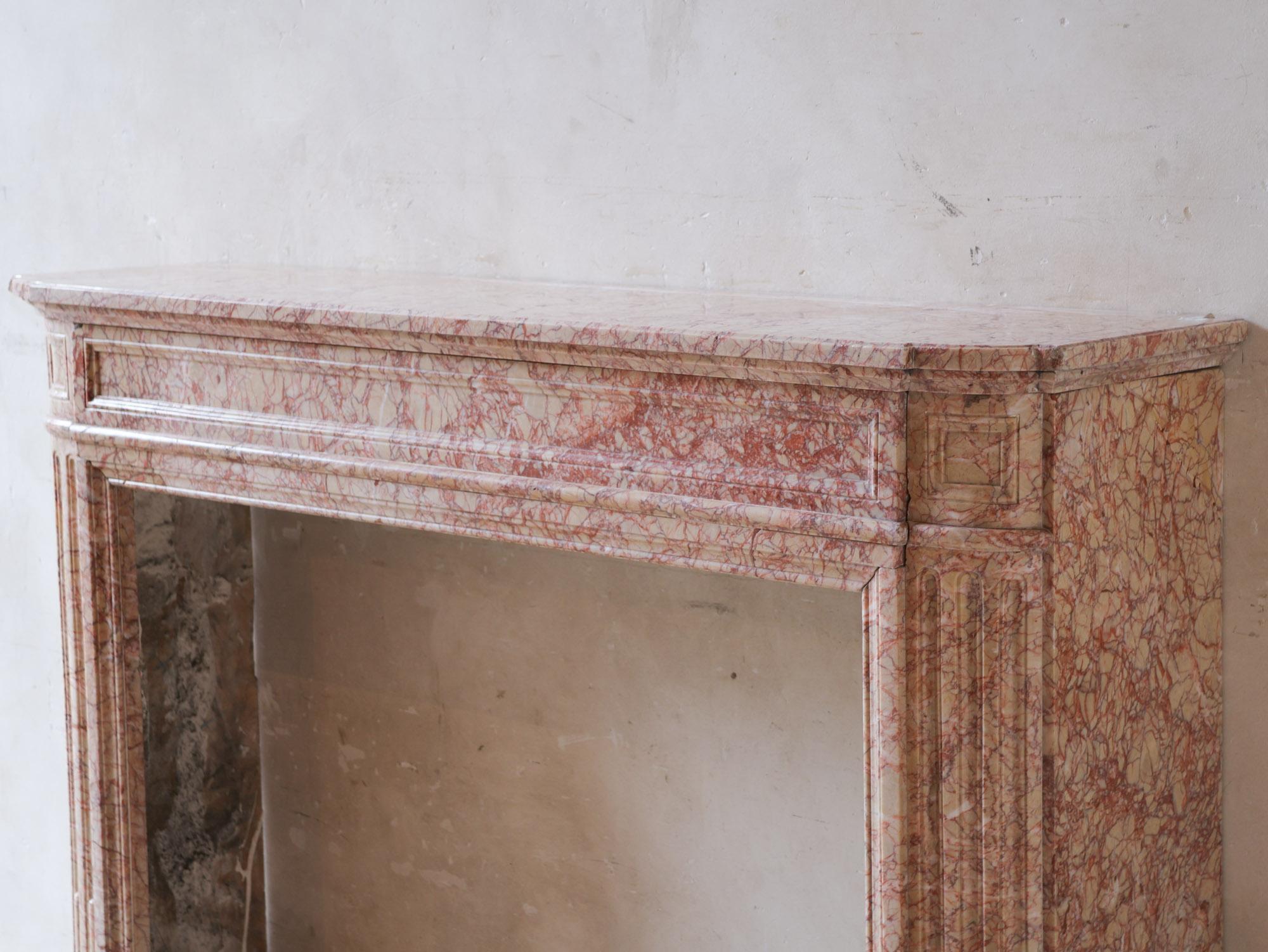 Antique French marble fireplace in pink tones For Sale 2