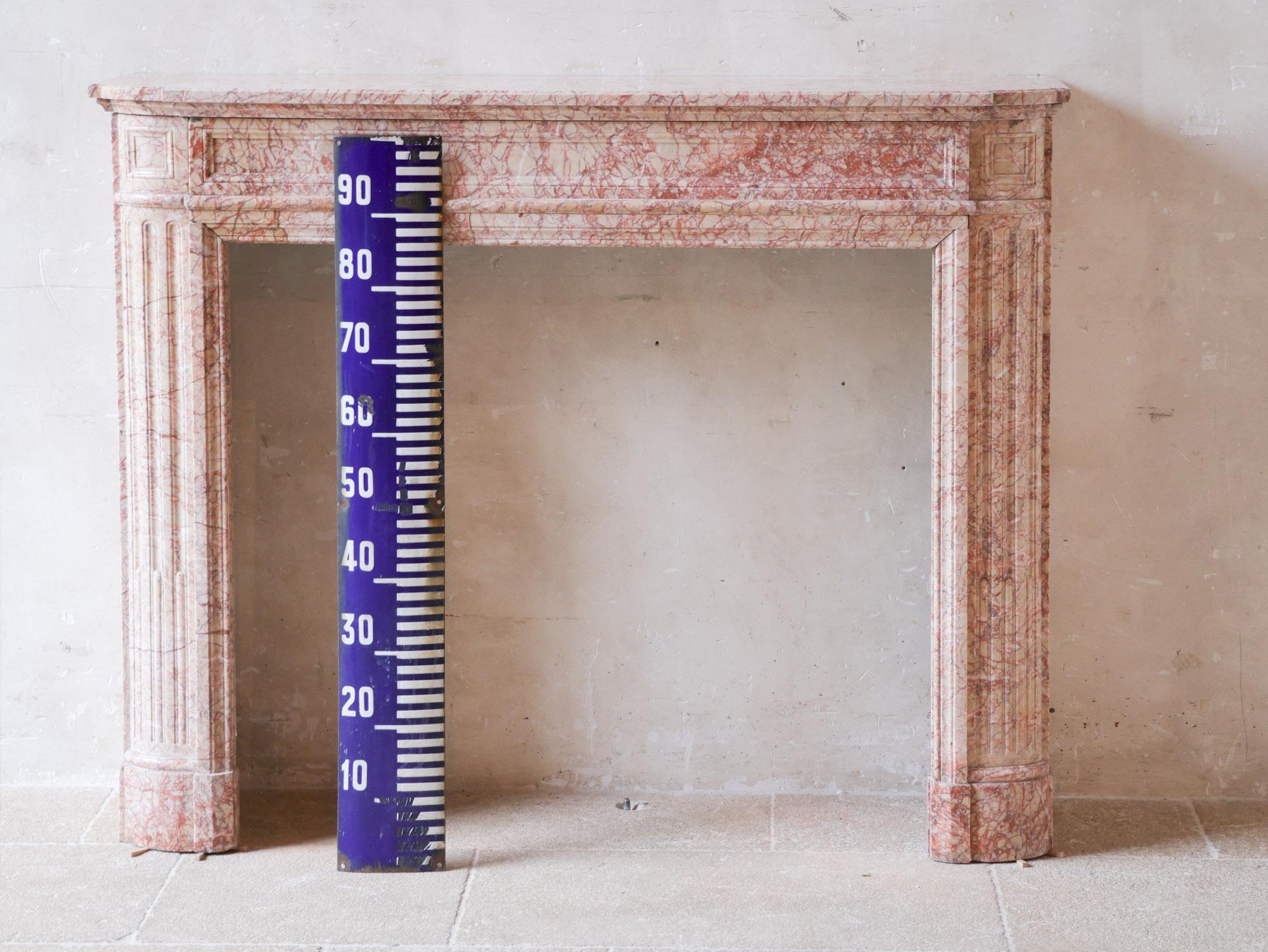 Antique French marble fireplace in pink tones For Sale 4