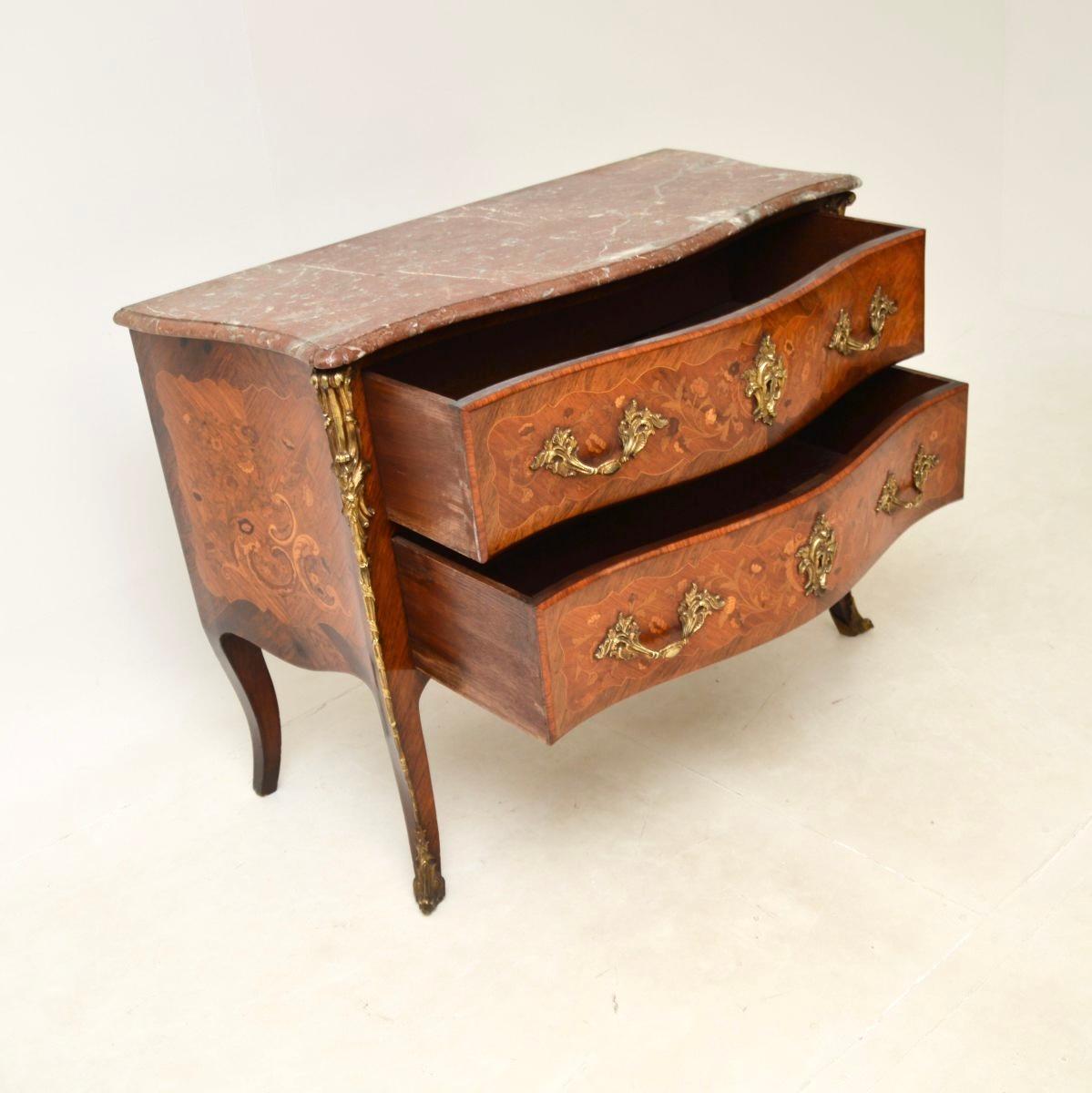 An absolutely stunning antique French marble top bombe commode. This was made in France, it dates from around the 1890-1910 period.

It is of outstanding quality, the top drawer is stamped Maple & Co, which is where it would have been originally
