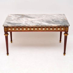 Table basse ancienne à plateau de marbre