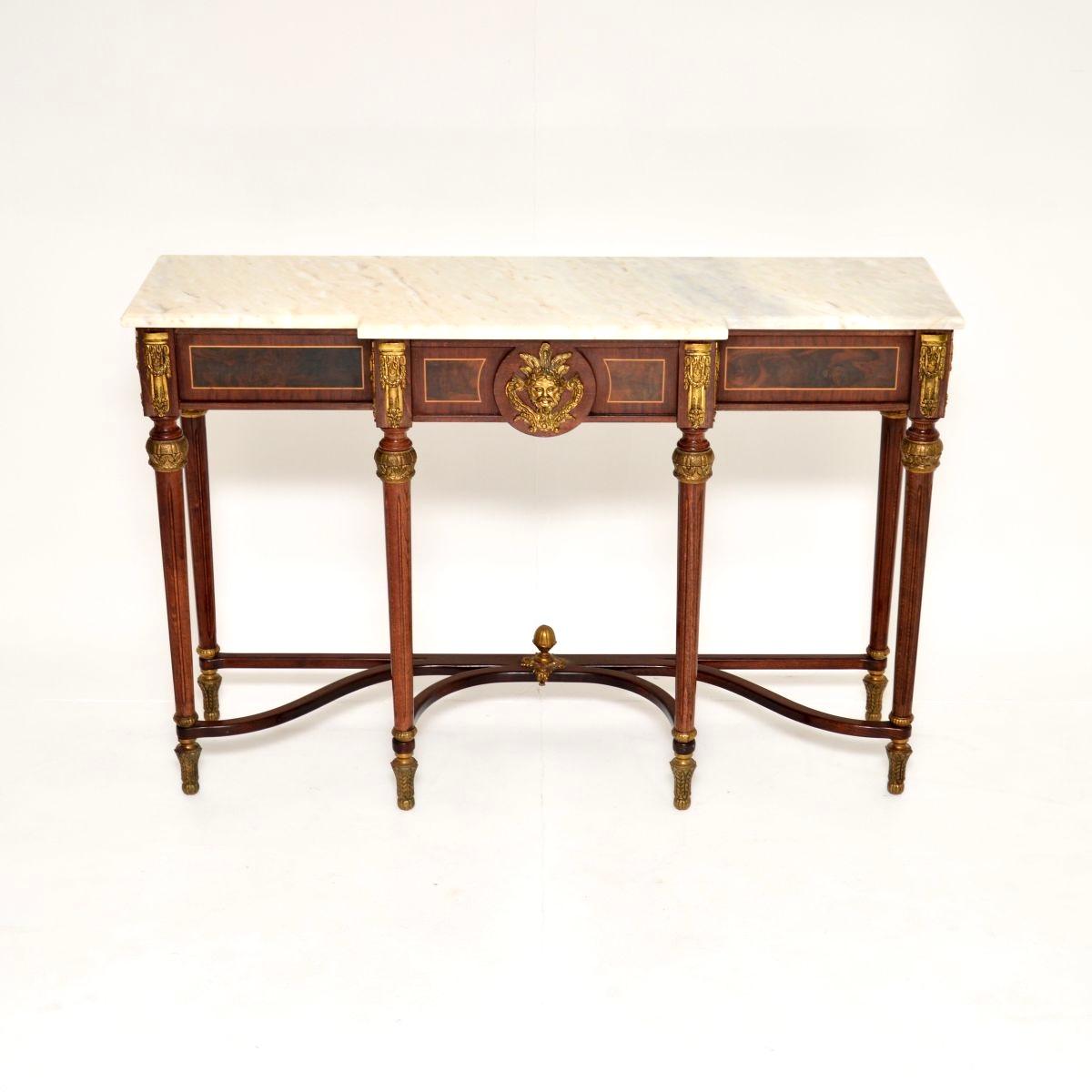 An absolutely stunning and very impressive antique French marble top console table, dating from around the 1930’s.

This is of superb quality, it is a great size and has lots of beautiful features. It is made from burr walnut, and adorned with high