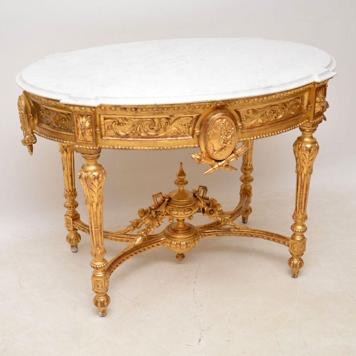 Very impressive & ornate large marble top gilt wood centre table or side table. It’s antique French, in good original condition, with some minor damage which we have tried to show in the images, so please enlarge them all. The marble top has a small