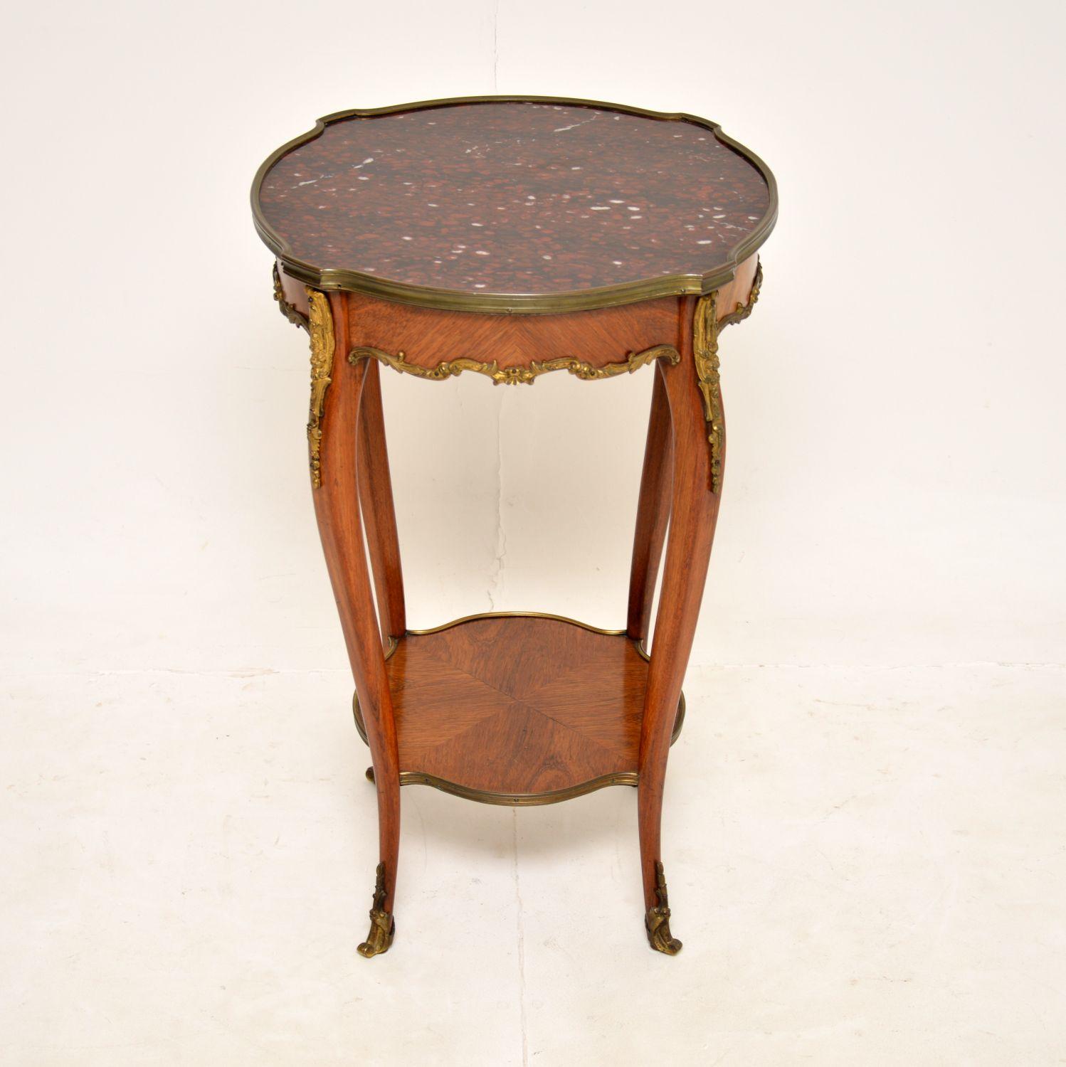 A stunning original antique French marble top side table, dating from around the 1880-1890 period.

It is of superb quality, beautifully constructed from walnut with extremely fine gilt bronze mounts & feet. The original marble top is absolutely