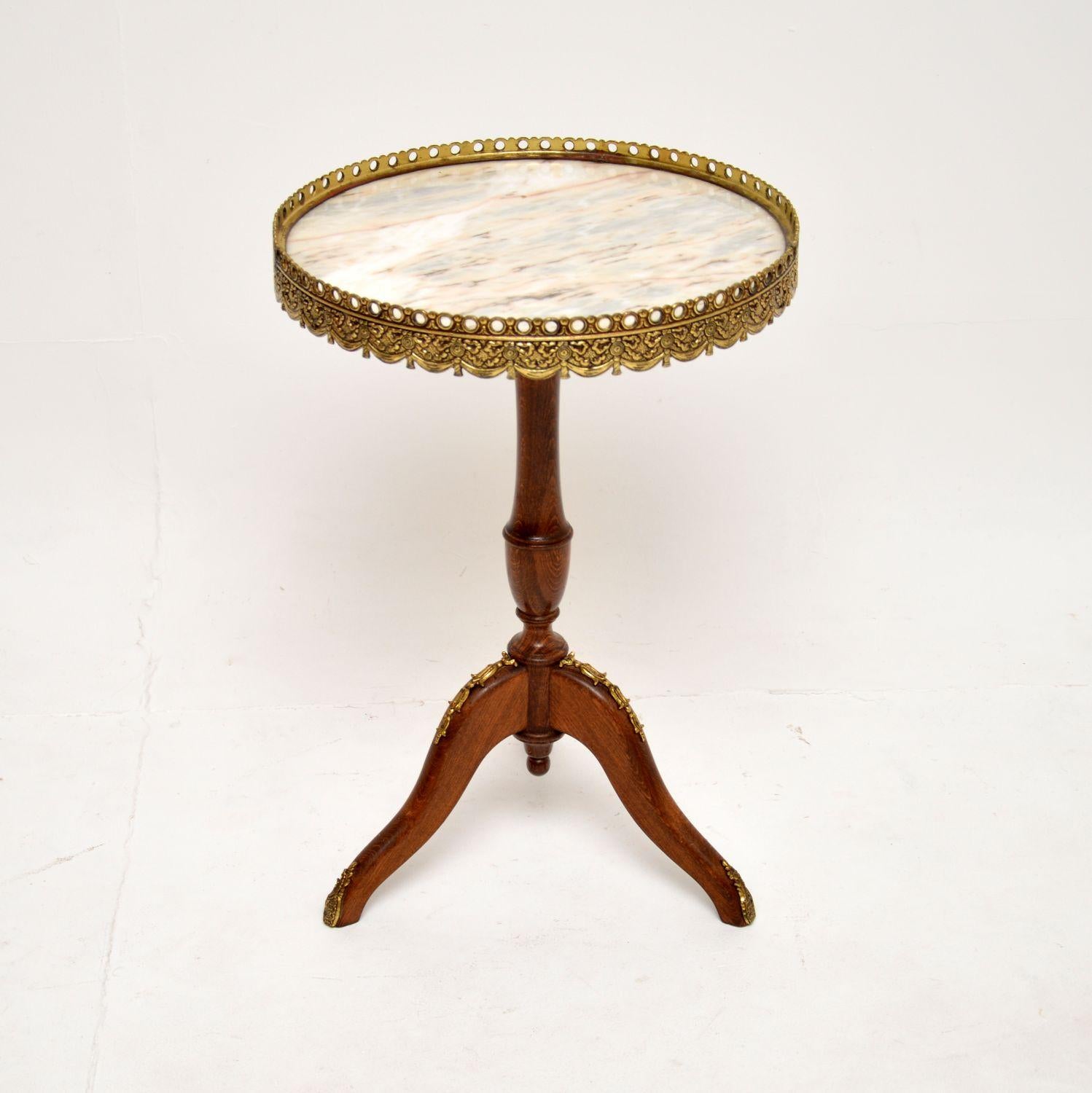 A beautiful and very well made antique French marble top wine table, dating from around the 1930’s.

This is of superb quality, it is very sturdy and is a useful size. The solid wood frame has high quality ormolu mounts and a gorgeous pierced ormolu