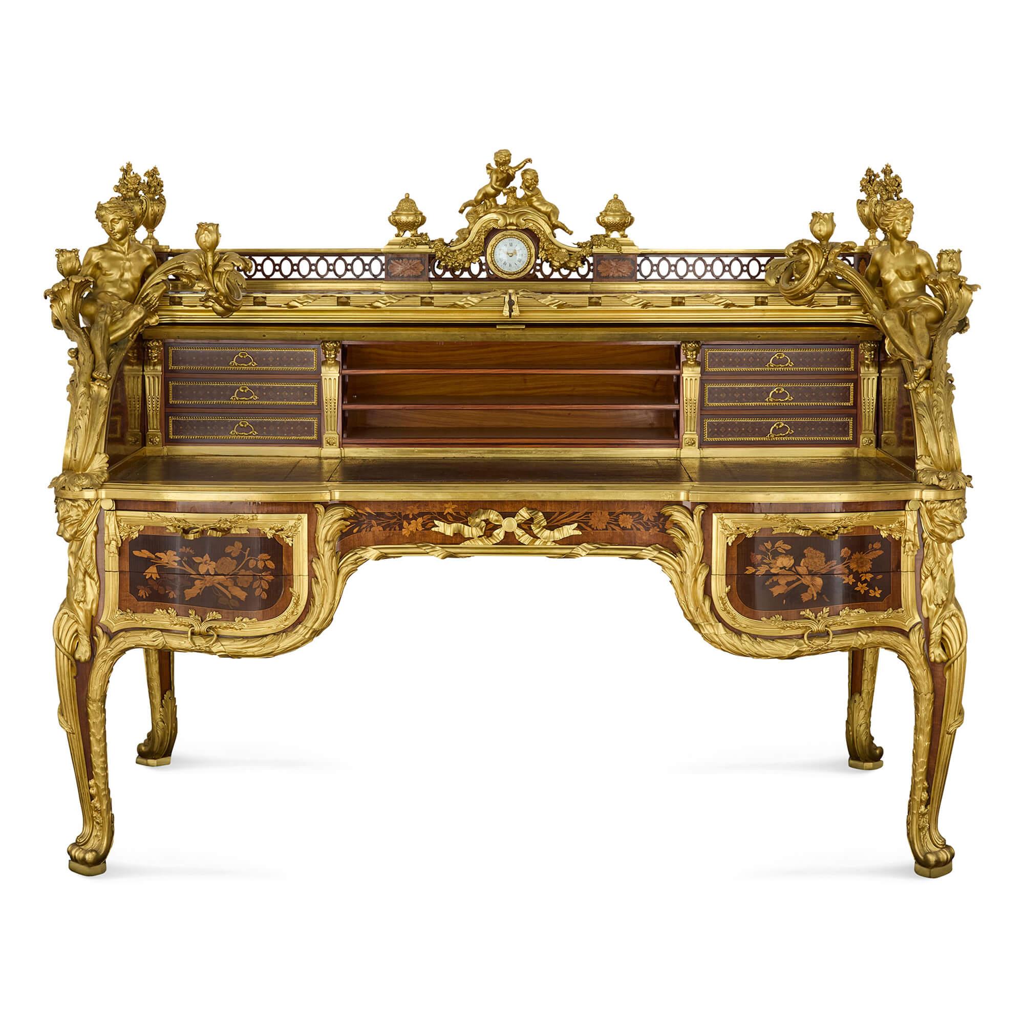 Bureau du Roi en marqueterie, bronze doré et jaspe ancien de Beurdeley 
Français, C.C.
Hauteur 151cm, largeur 190cm, profondeur 100cm

Le Bureau du Roi, également connu sous le nom de secrétaire à cylindre, est l'un des chefs-d'œuvre les plus