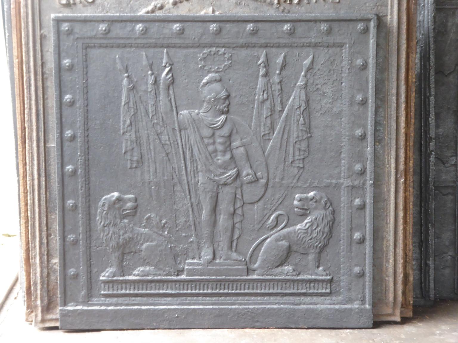 18th / 19th century French neoclassical fireplace fireback with the god mars. God of strength, fertility and protector of cattle.

The fireback is made of cast iron and has a black / pewter patina. The fireback is in a good condition and does not