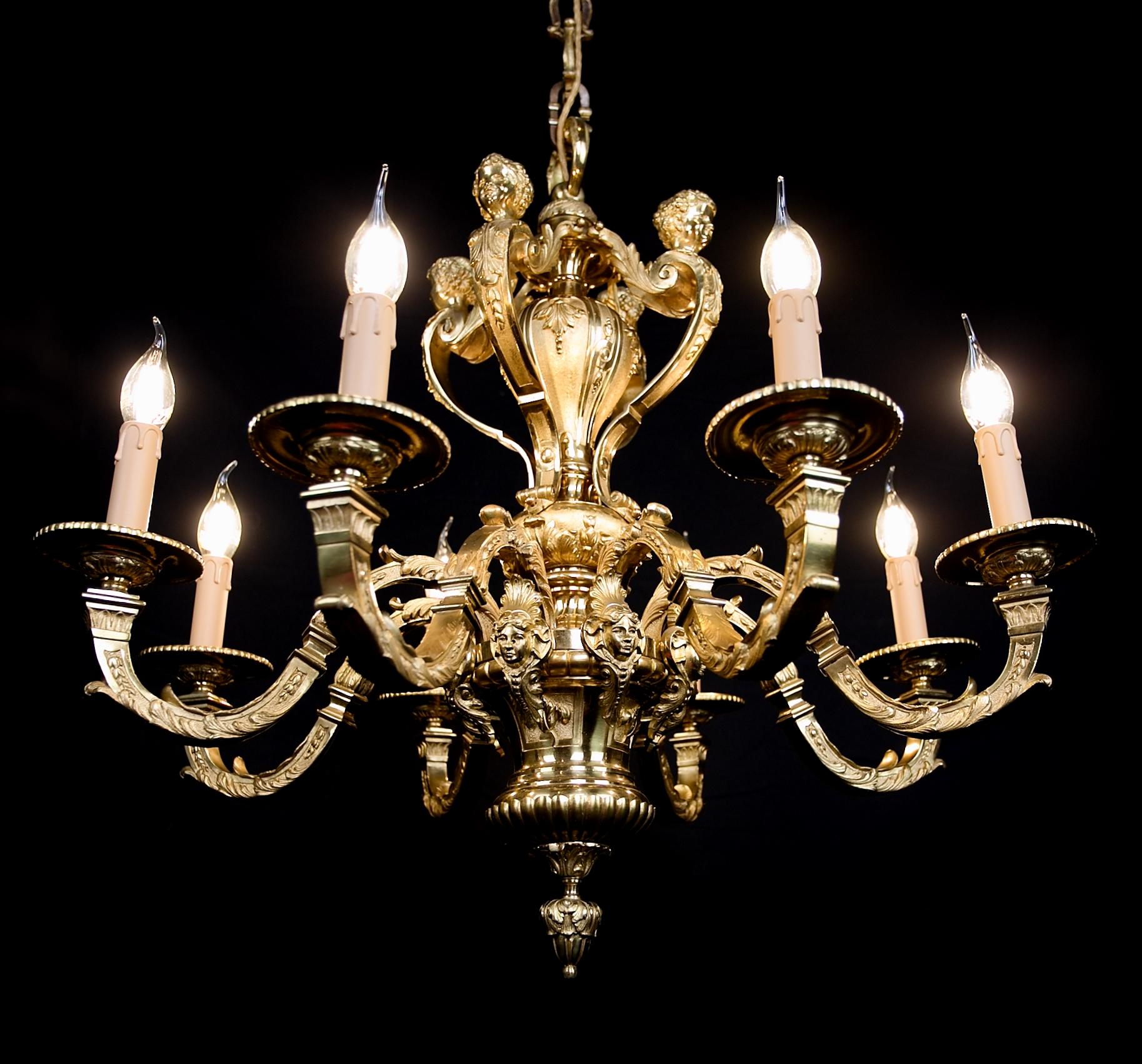 Antique French Mazarin Bronze Chandelier

A heavy eight-armed bronze chandelier in the style of Louis XIV. The upper part decorated with cherub heads on an acanthus leaf and the lower part with caryatid heads. Elaborated in detail. The chandelier