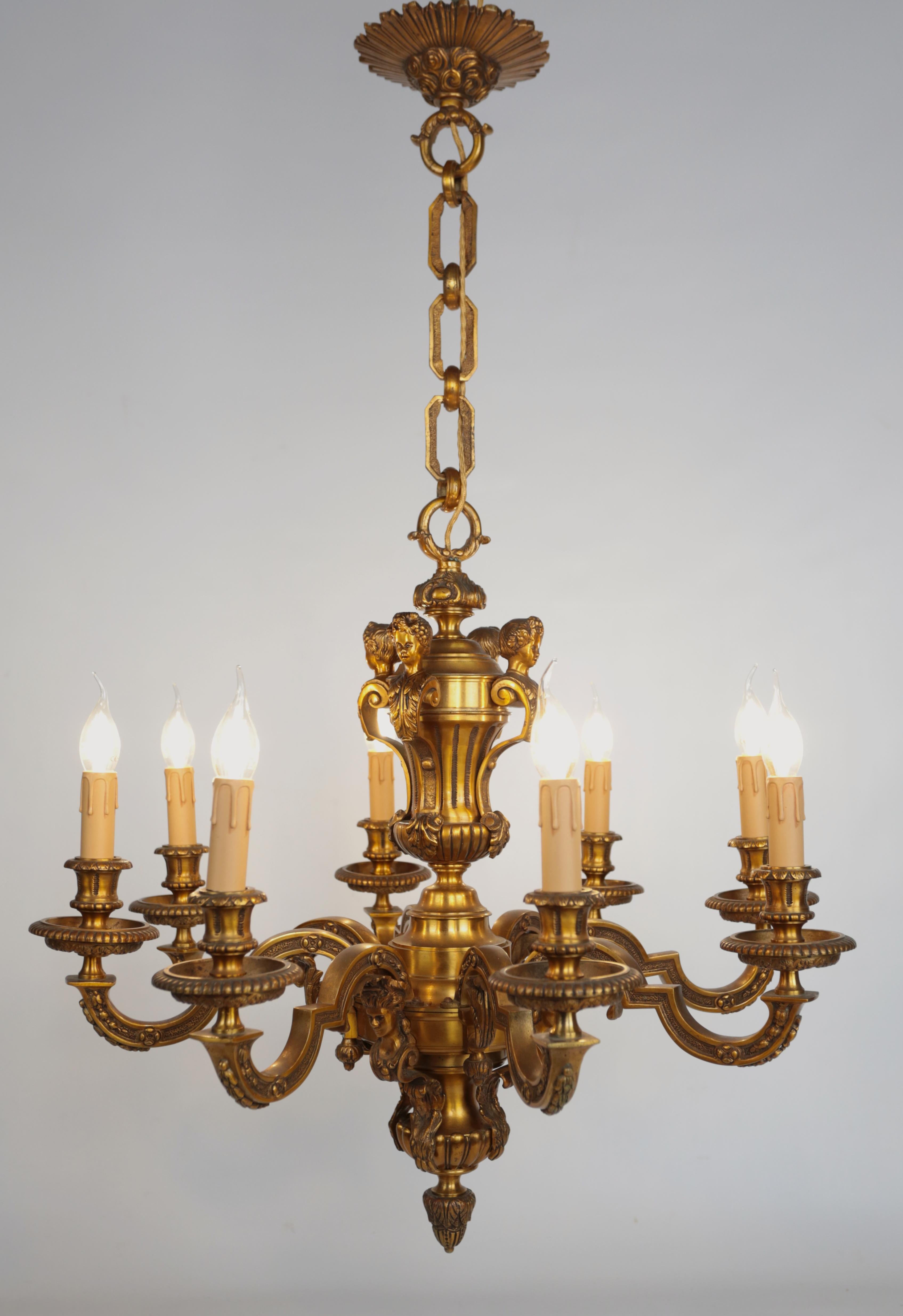 Antique French Mazarin Bronze Chandelier

A heavy eight-armed bronze chandelier in the style of Louis XIV. The upper part decorated with cherub heads on an acanthus leaf and the lower part with caryatid heads. Elaborated in detail. The chandelier