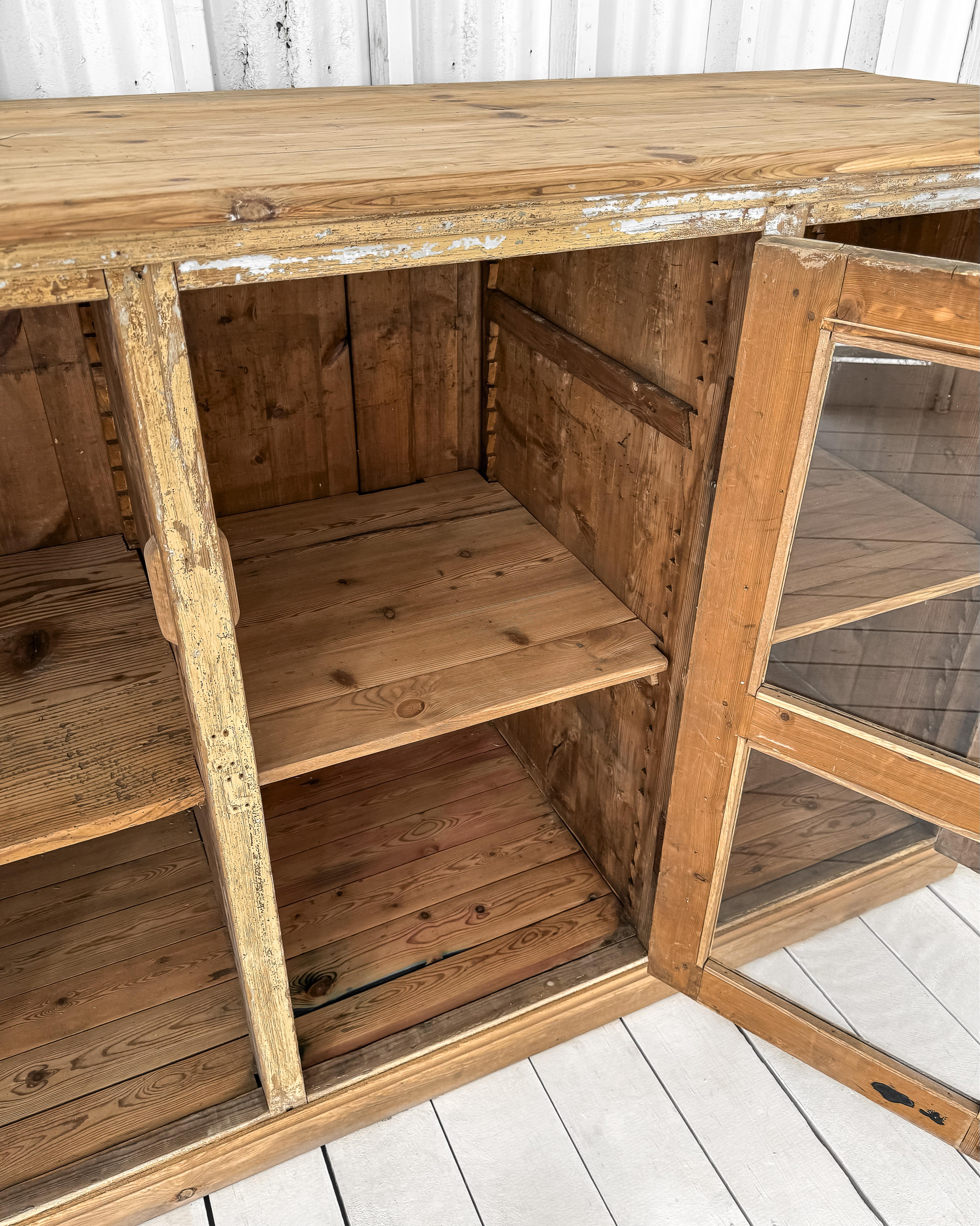 Antique French Mercantile Showcase with 4 Doors 13