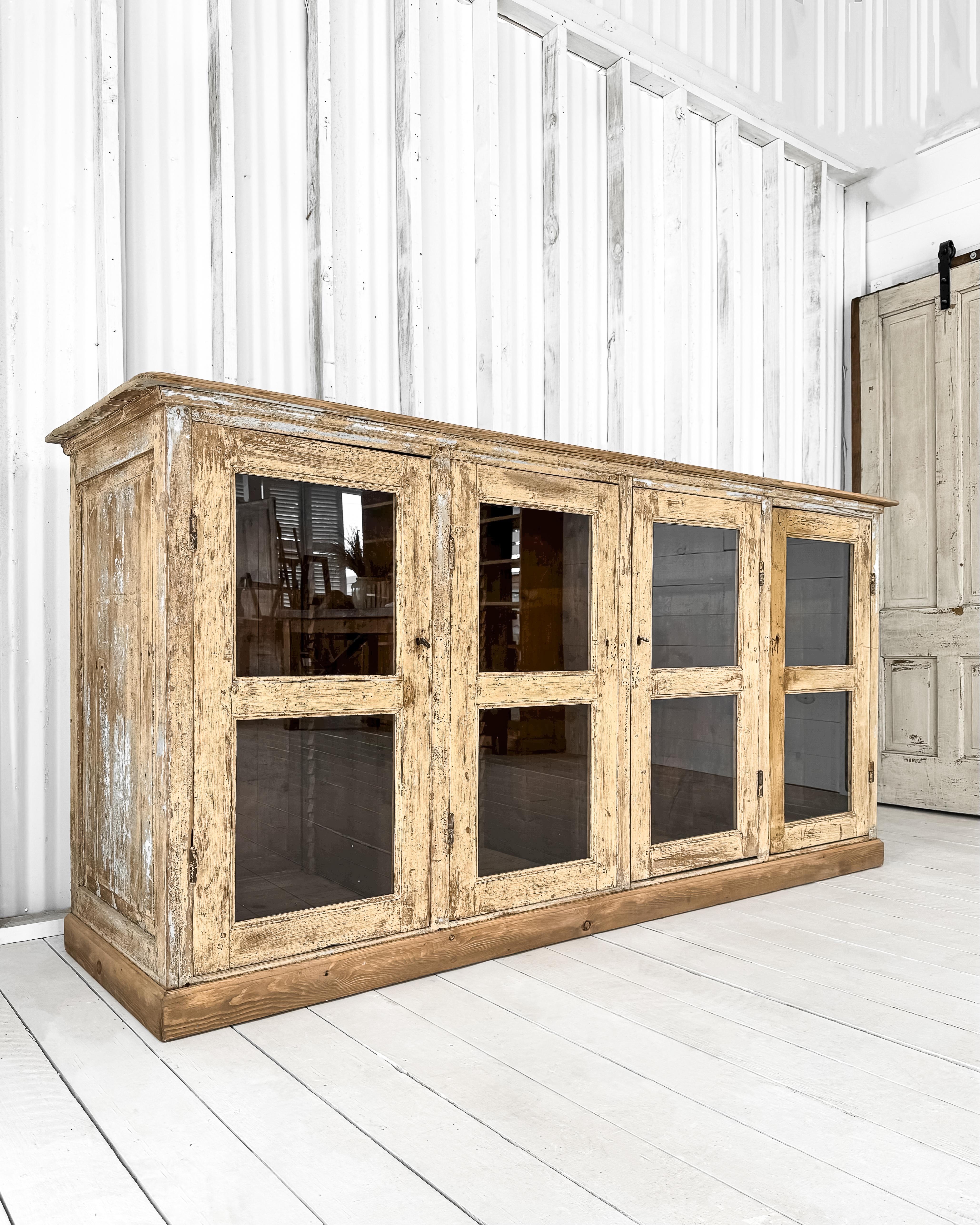 20th Century Antique French Mercantile Showcase with 4 Doors