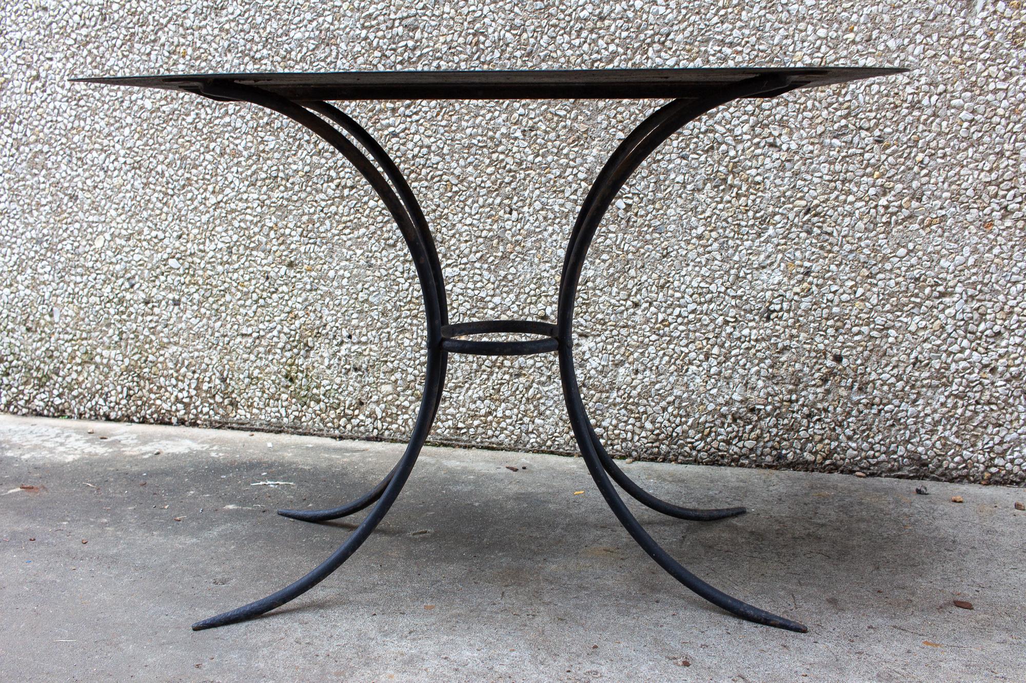 Discovered during our recent time in France, we love the lines of this stylish garden table that would also be lovely as a smaller dining option in a kitchen or on a porch. With sleek, clean lines, this metal garden table in a charcoal finish