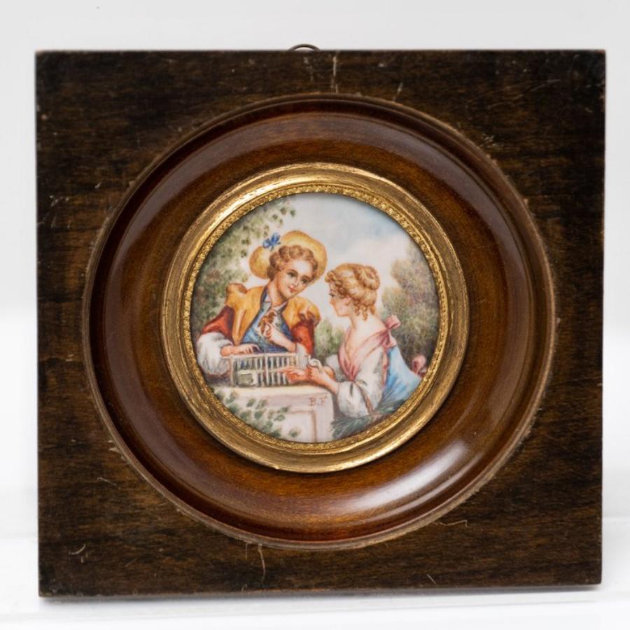 This exquisite antique French School miniature painting on porcelain is a true gem of artistry and craftsmanship. Created by a skilled artist of the French School, this delicate work of art showcases the intricate detail and refined techniques