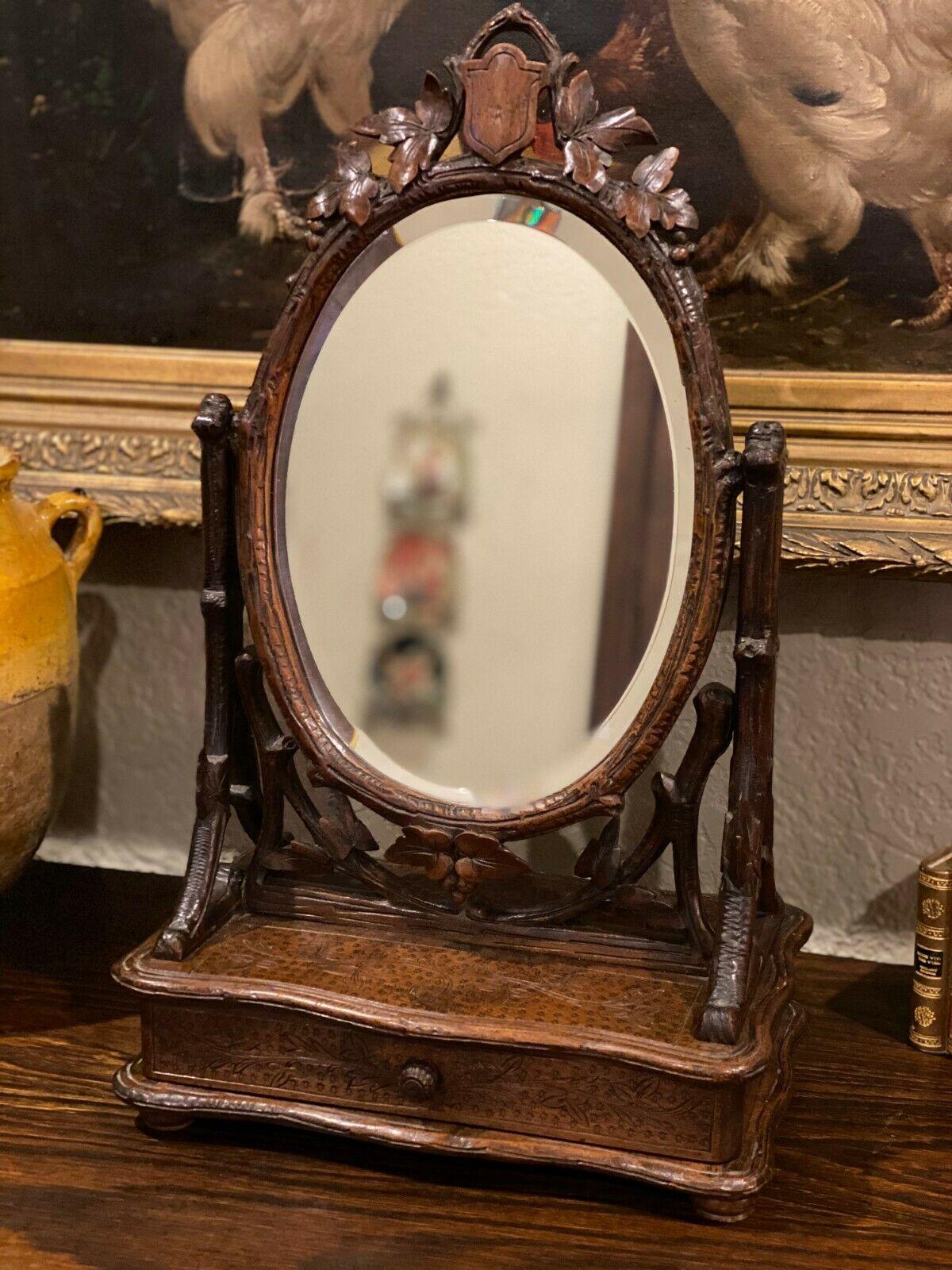 Superb and dainty antique French oak black forest tilting table top dresser or vanity beveled mirror jewelry box with drawer~~c. 1880s
 
 We can't say enough wonderful things about this exquisitely carved vanity mirror~~Black Forest decorative