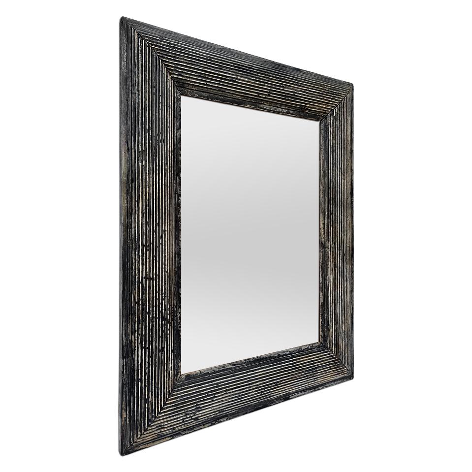 Antique 50's French frame mirror with stucco decoration of fine black patina fluting. Antique frame width:  9 cm / 3.54 in. Modern glass mirror. Wood back.