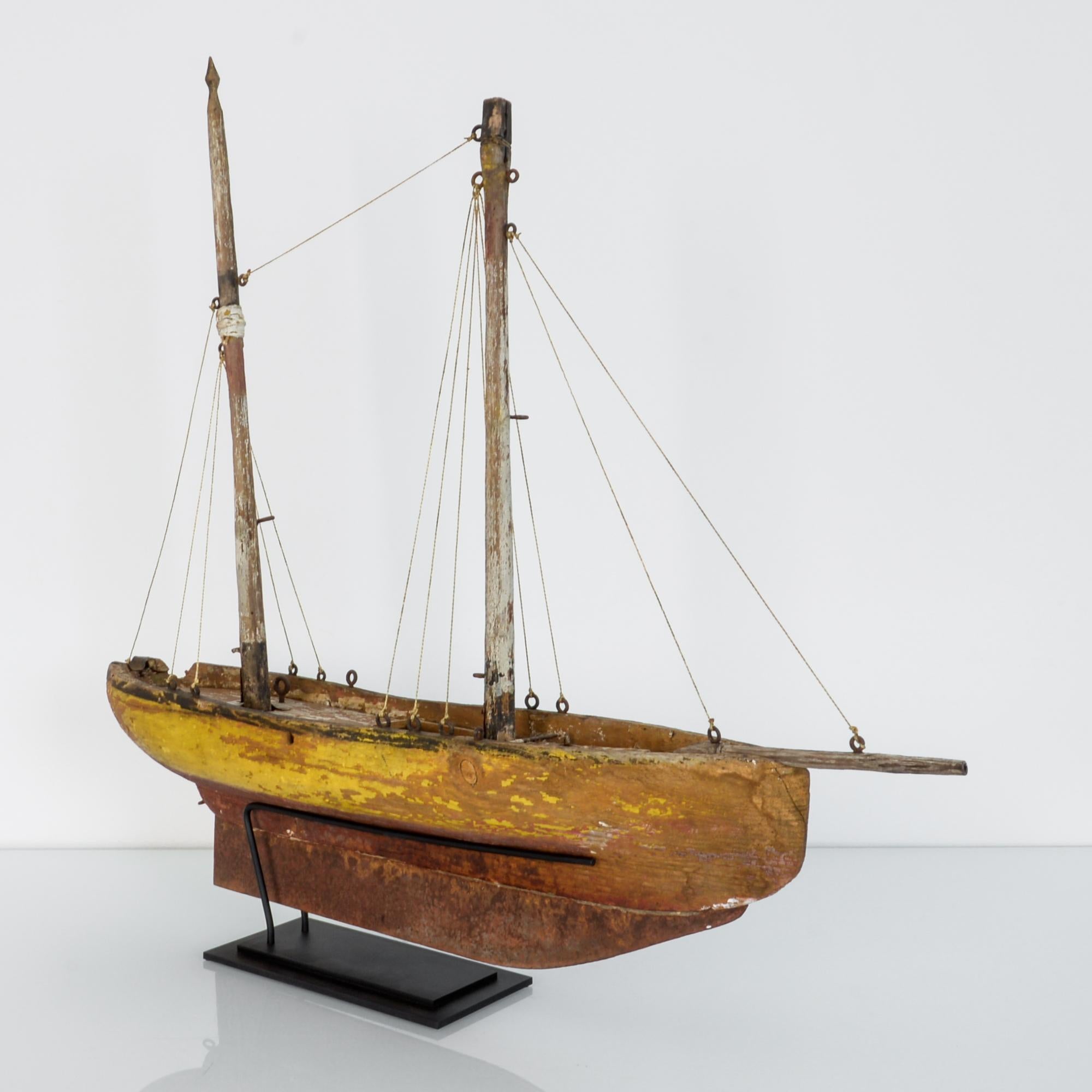 From bow to stern, this vintage nautical miniature makes a whimsical decoration, circa 1950 France, made from rustic materials with refined details, in soft wood, hobby paint, wires, hooks and string, amazing texture.