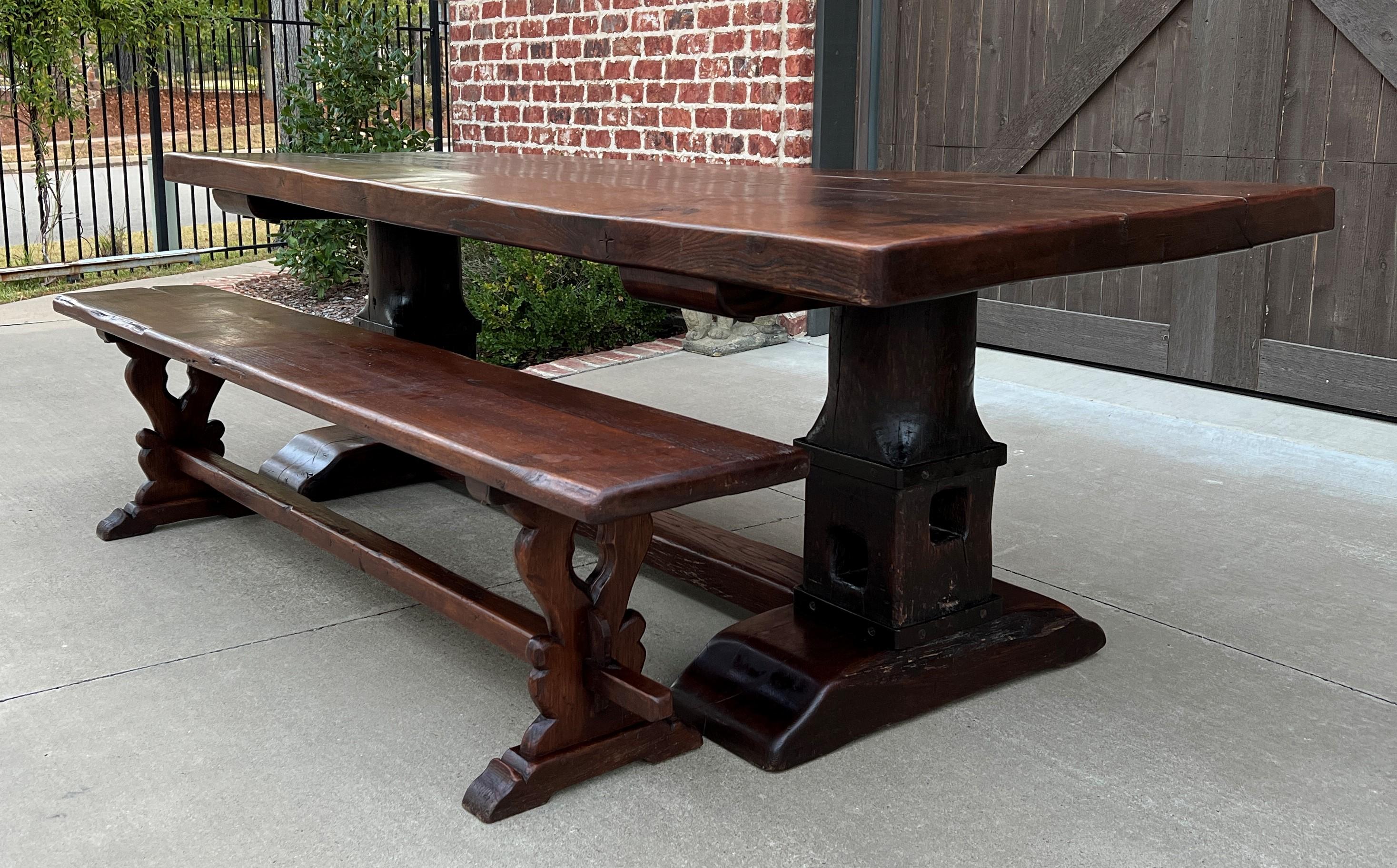 Stunning antique French country oak monastery refectory farm farmhouse dining table conference library table or desk with trestle base and iron straps~~c. Early 19th century.

This old Monastery table has 