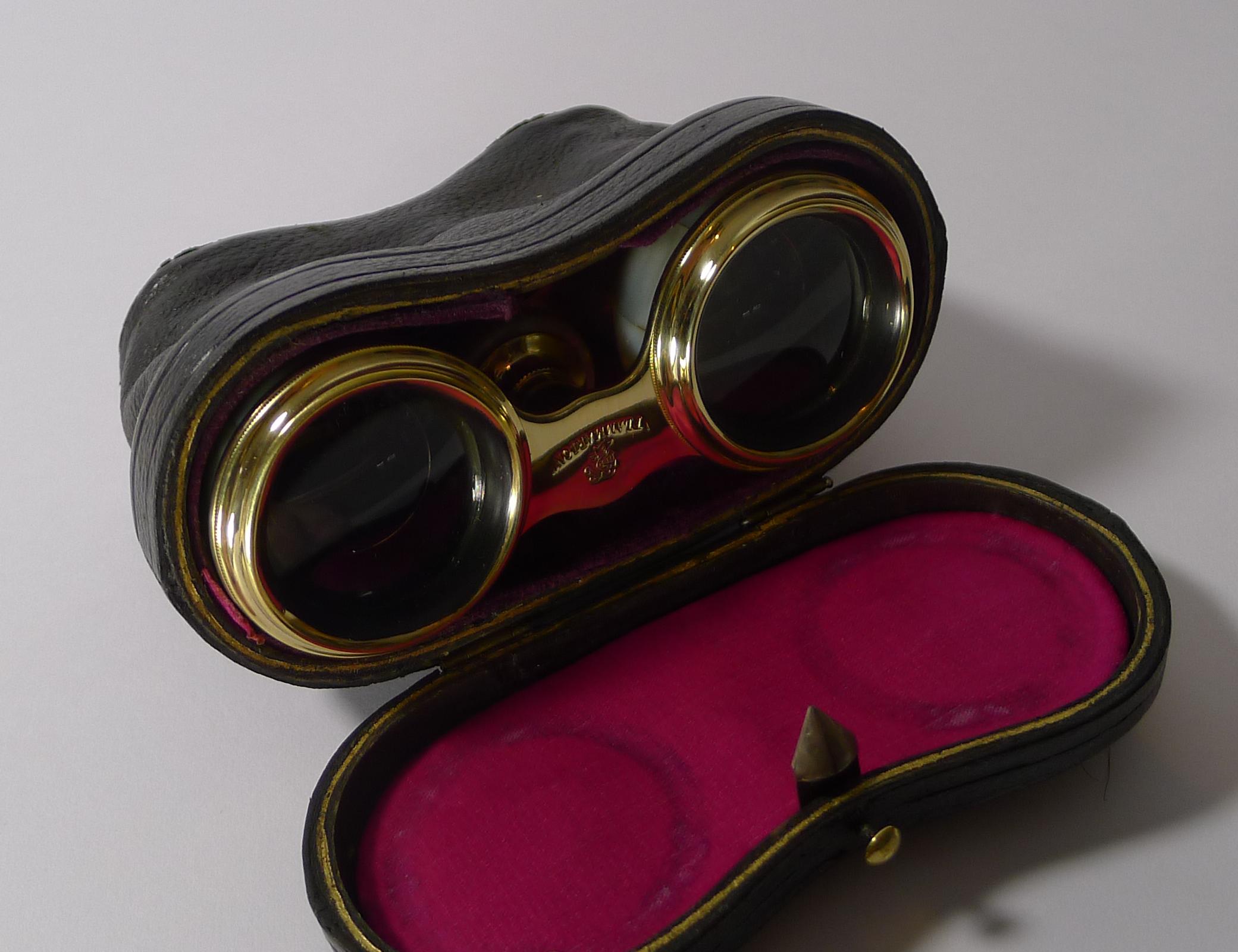 A handsome pair of antique Opera glasses professionally cleaned and polished, restoring them to their former glory dating to circa 1900.

They come with their original leather case lined in silk. The glasses are clad in mother of pearl or Nacre