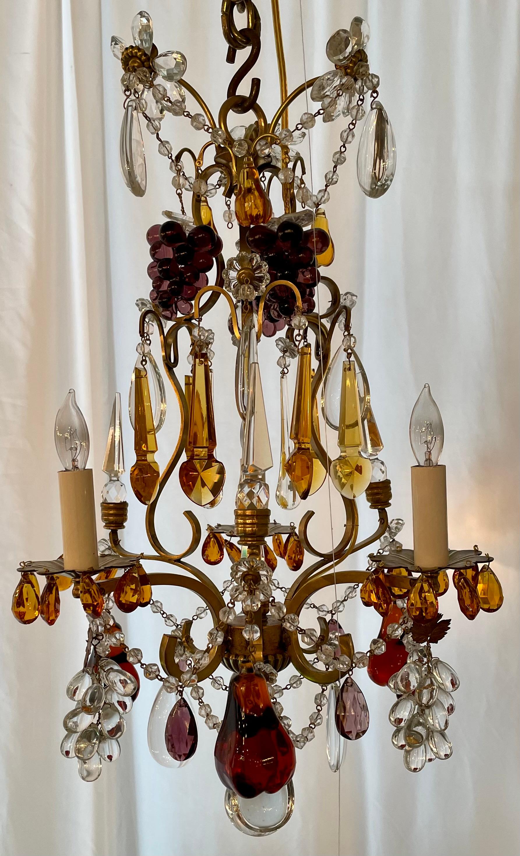 Antique French Clear & Multi-Colored Baccarat Crystal and Gold Bronze Chandelier, Circa 1880.
With purple grape clusters, dark amber pears and amethyst, amber and clear prisms.  