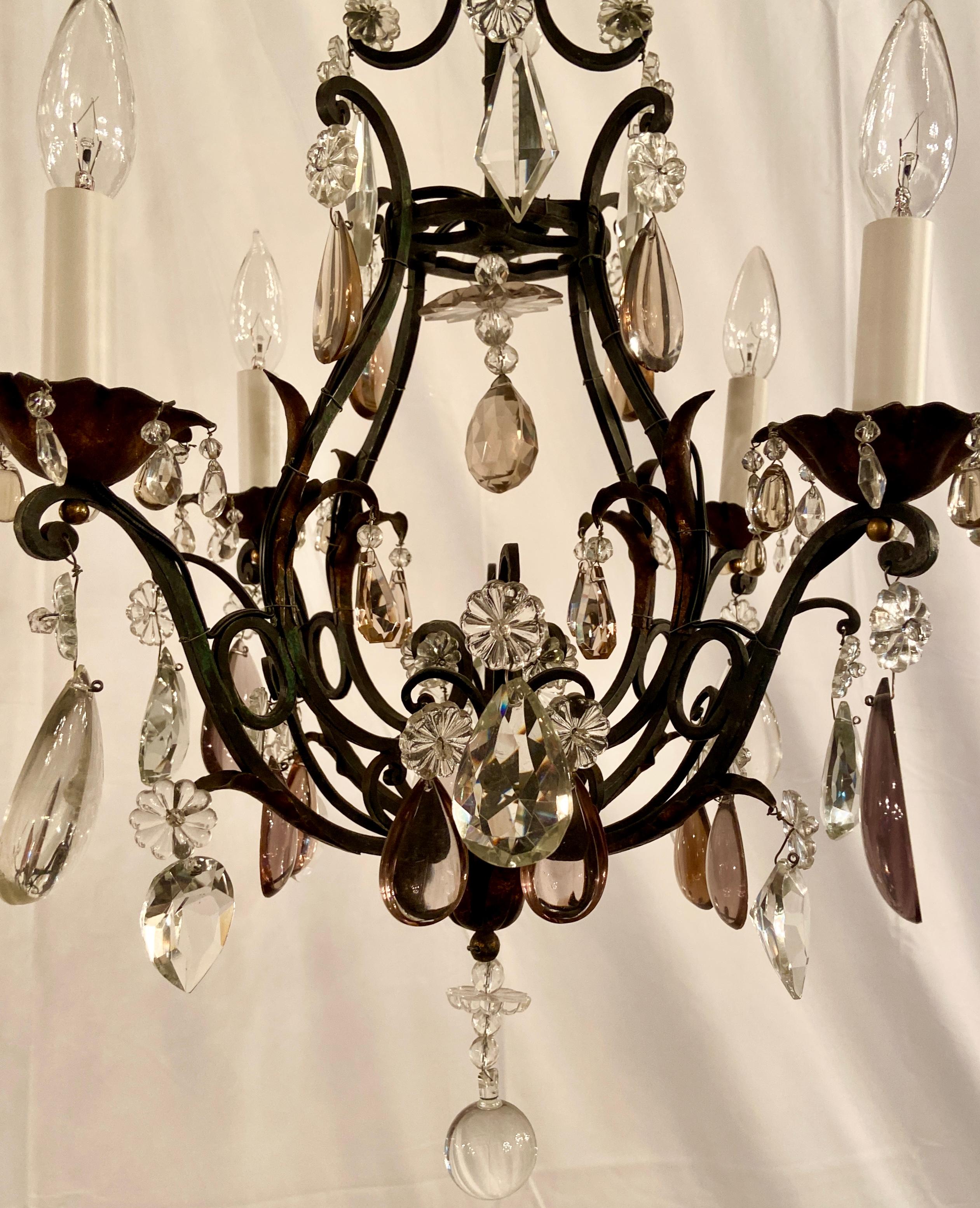 Small antique French multi-colored and clear crystal wrought iron chandelier, Circa 1910-1920.