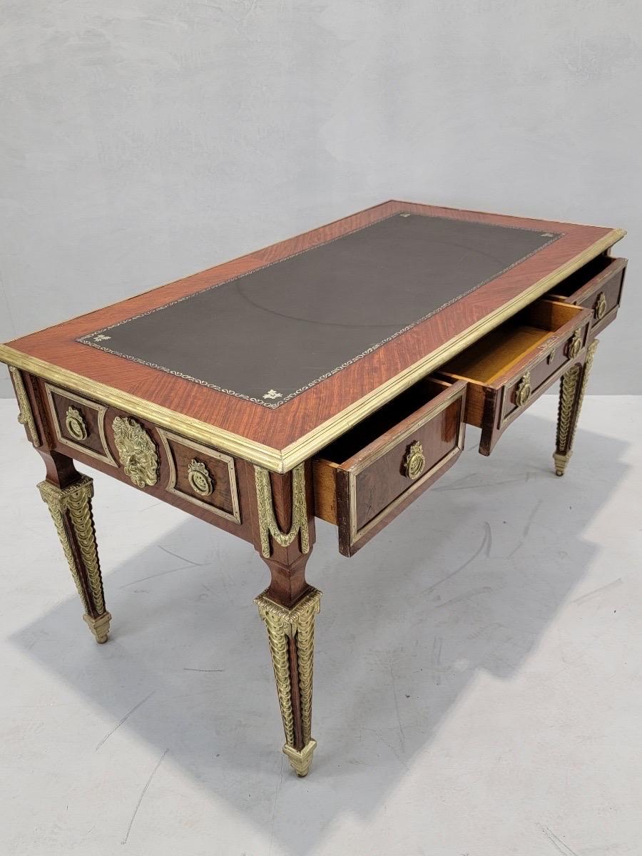 Antique French Napoleon Brass Ormolu Mounted 3 Drawer Writing Desk

Antique French Napoleon III writing desk, made of mahogany wood, covered with remarkable marquetry veneers and finely detailed ornate mounted brass ormolu. This exceptional desk