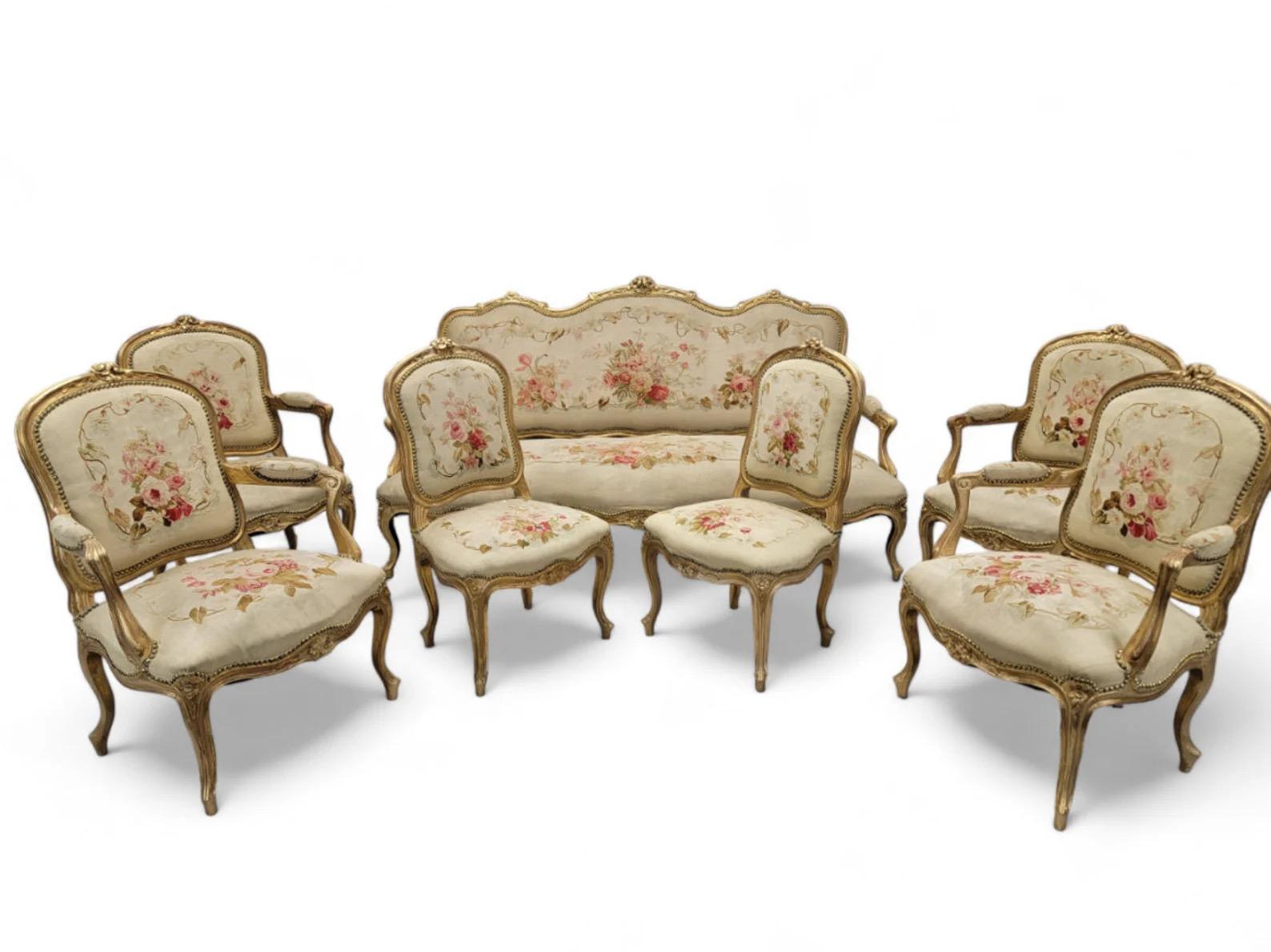 Antique French Napoleon III Style Giltwood Aubusson Settee & Fauteuils 7 Piece Parlor Set

This exquisite Antique French Napoleon III Style Gilt-wood Aubusson Settee and Fauteuils 7 Piece Parlor Set embodies the elegance of the Louis XV style,