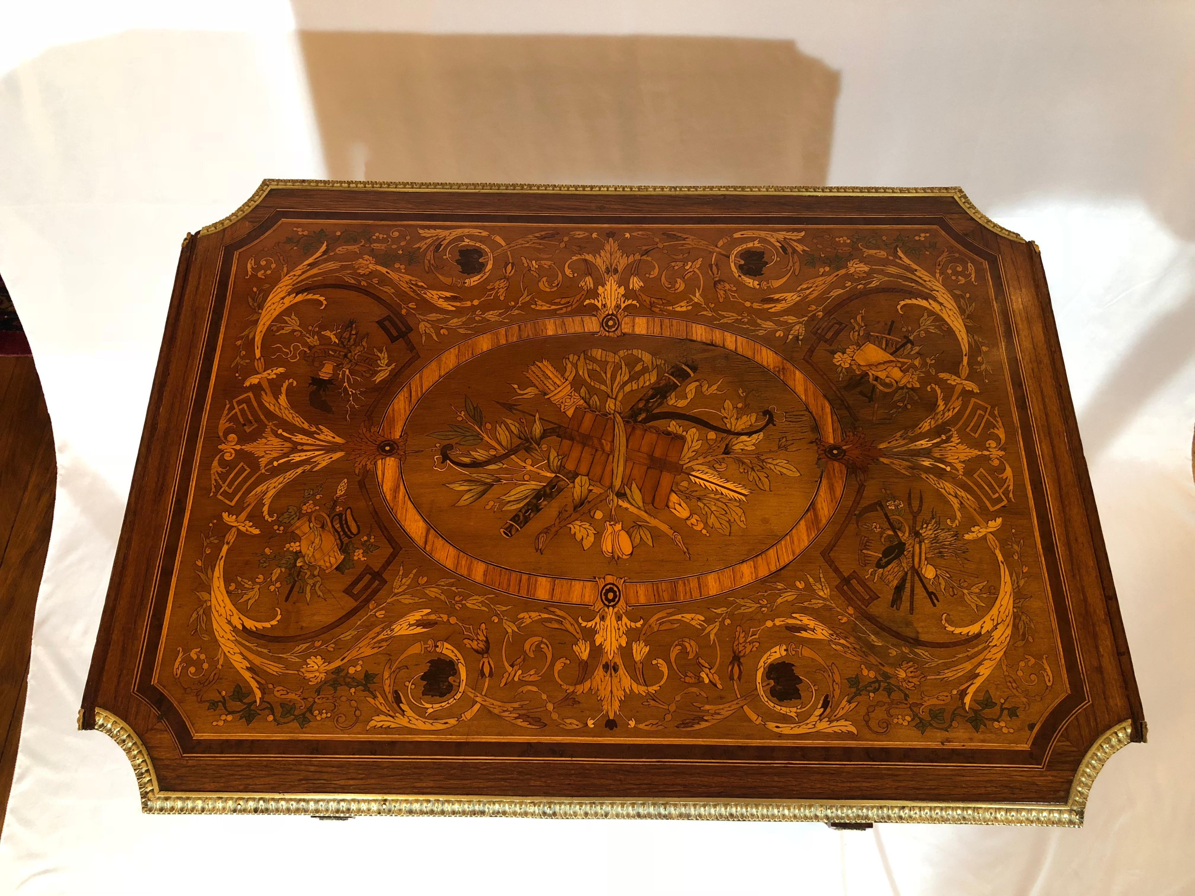 This beautiful table shows off fine quality workmanship. When open, it measures 44.50 inches.