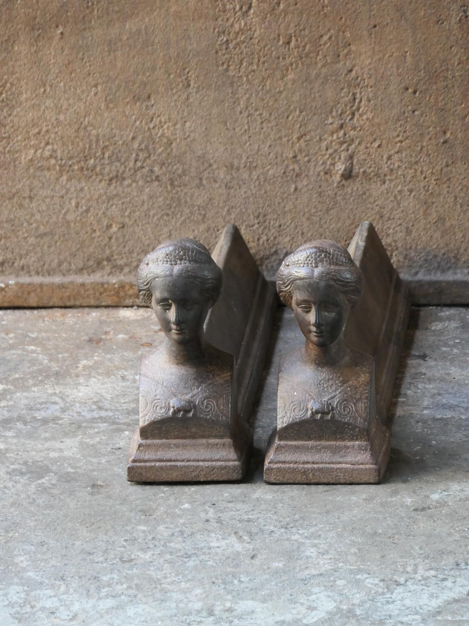 19th century French Napoleon III period andirons. The andirons are made of cast iron. They are in a good condition and fit for use in the fireplace.