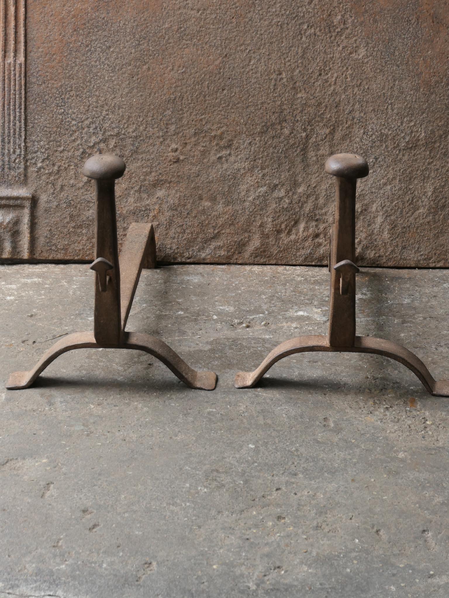 19th century French Napoleon III fireplace andirons or fire dogs, made of wrought iron. The andirons are in a good condition and are fully functional.