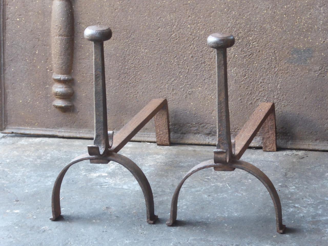 19th century French Napoleon III andirons. The andirons are made or wrought iron and have spit hooks to grill food.







 