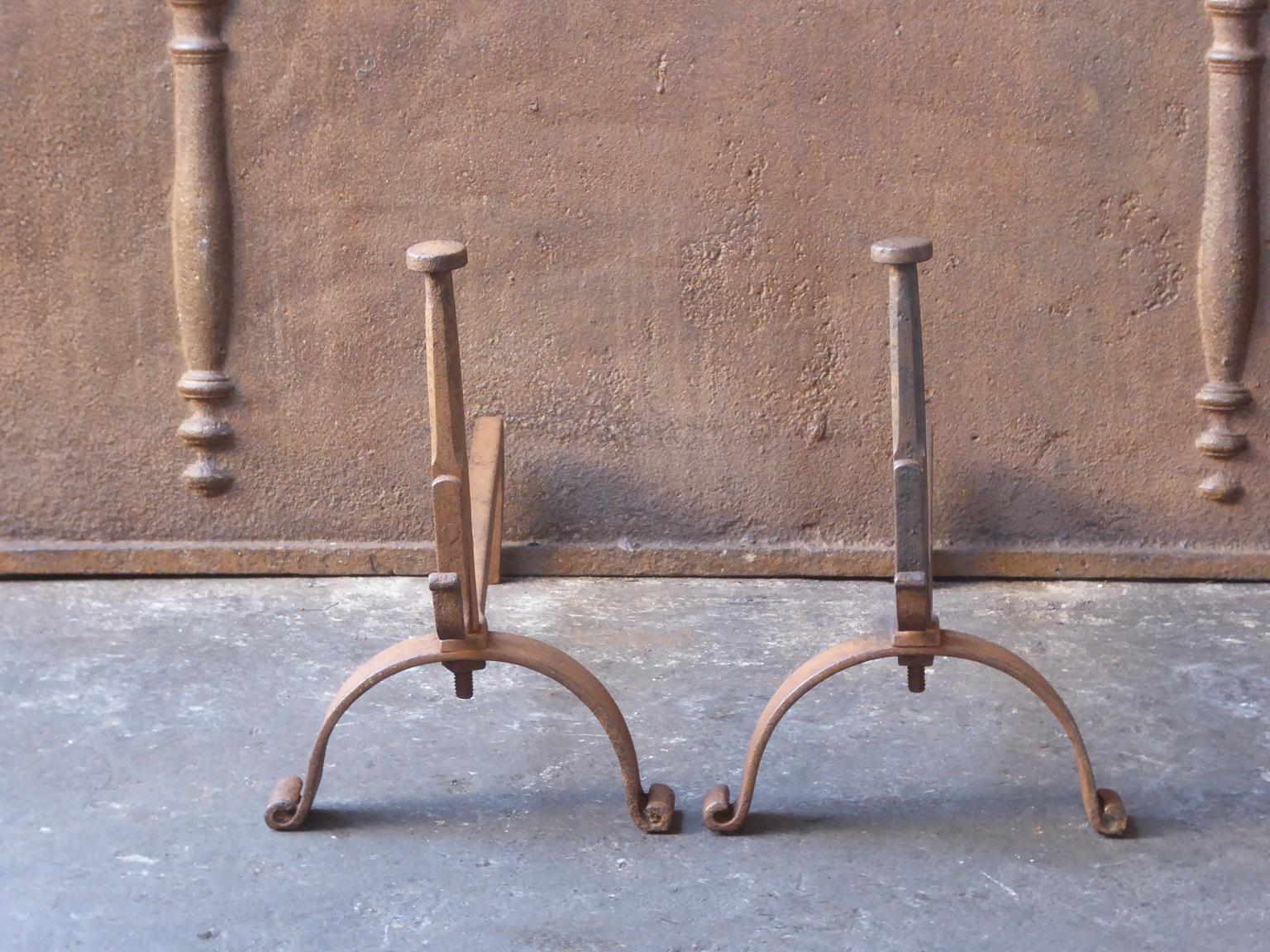 19th century French Napoleon III andirons. The andirons are made or wrought iron and have spit hooks to grill food.







 
