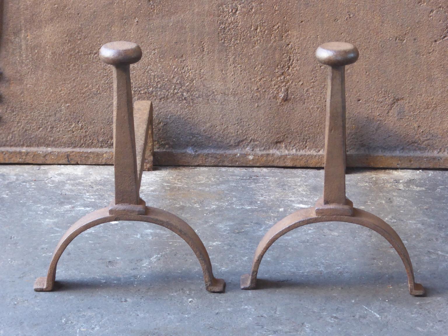 19th century French Napoleon III andirons. The andirons are made or wrought iron and have a natural brown patina.







 