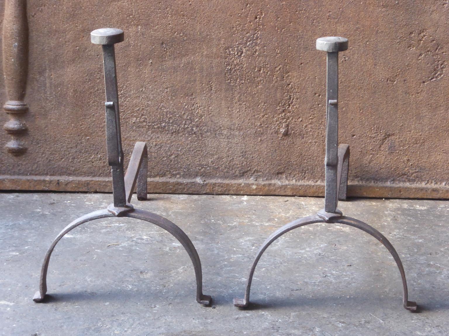 19th century French Napoleon III andirons. The andirons are made or wrought iron and have spit hooks to grill food.







   